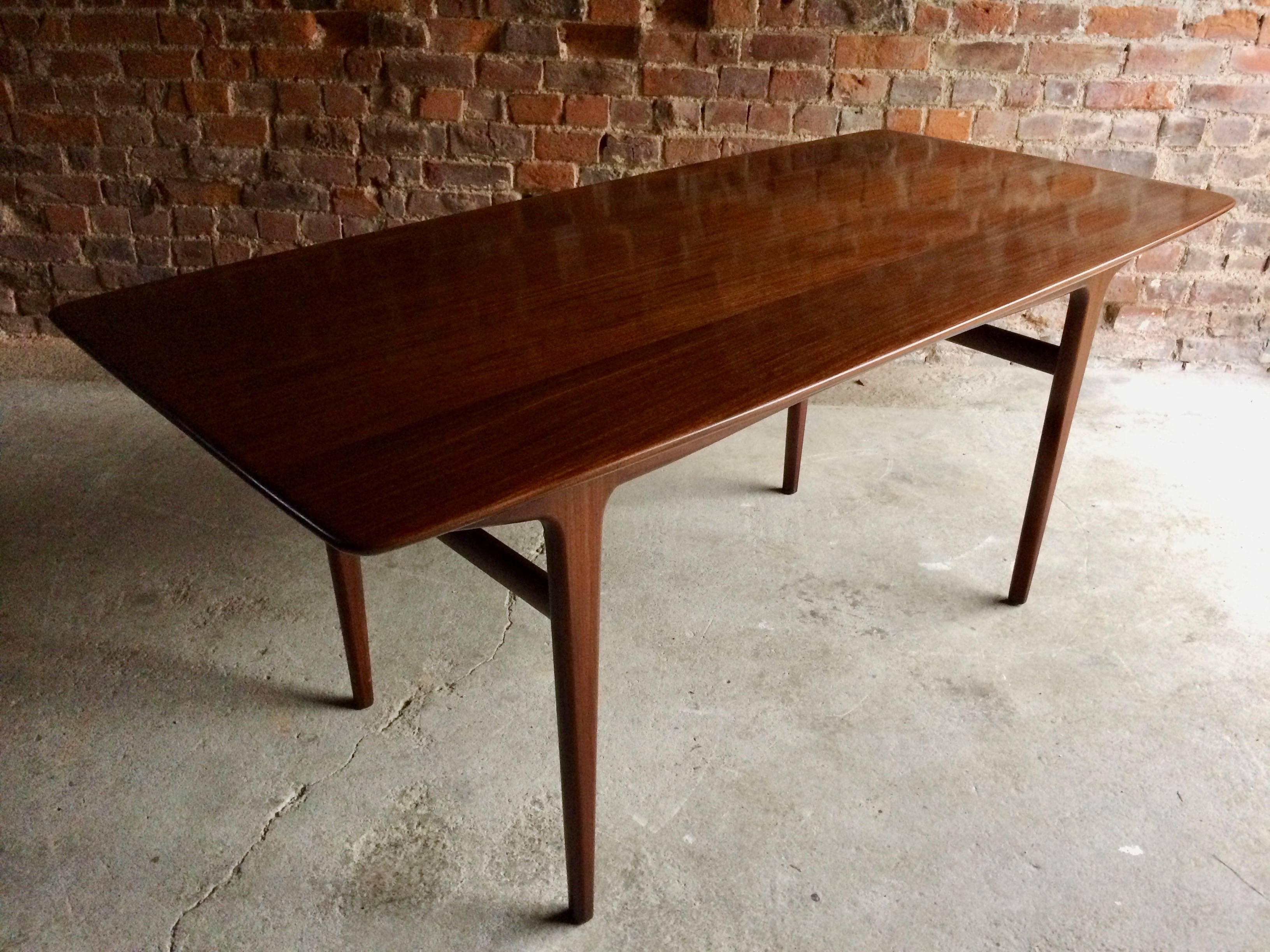 A magnificent midcentury Teak dining table by Danish designer Niels Otto Møller, and manufactured by JL Møllers Møbelfabrik circa 1960, this table has been completely refurbished and is offered as new.

Niels Otto Møller
JL Møllers