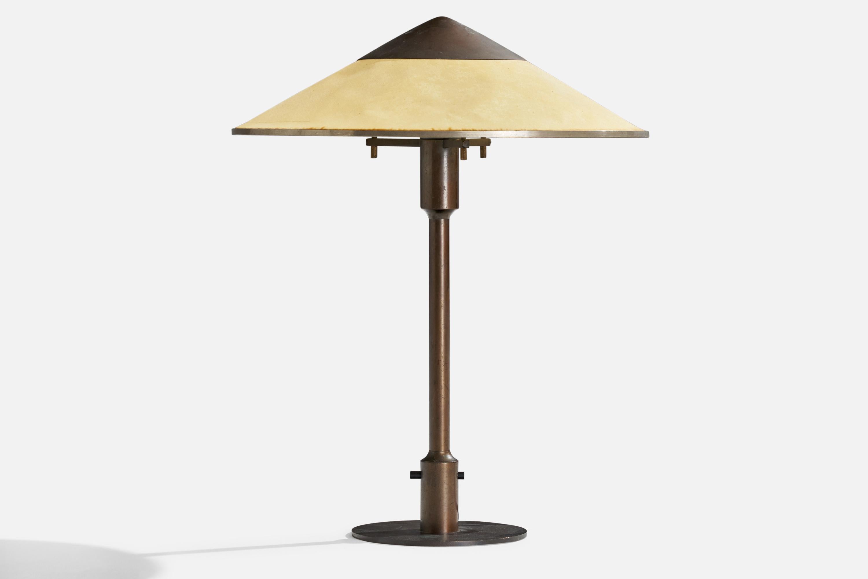 A copper and light yellow waxed paper table lamp designed and produced by Niels Rasmussen Thykier, Denmark, 1930s.

Overall Dimensions (inches): 19” H x 14.75” diameter

Bulb Specifications: E-26 Bulb
Number of Sockets: 1
All lighting will be