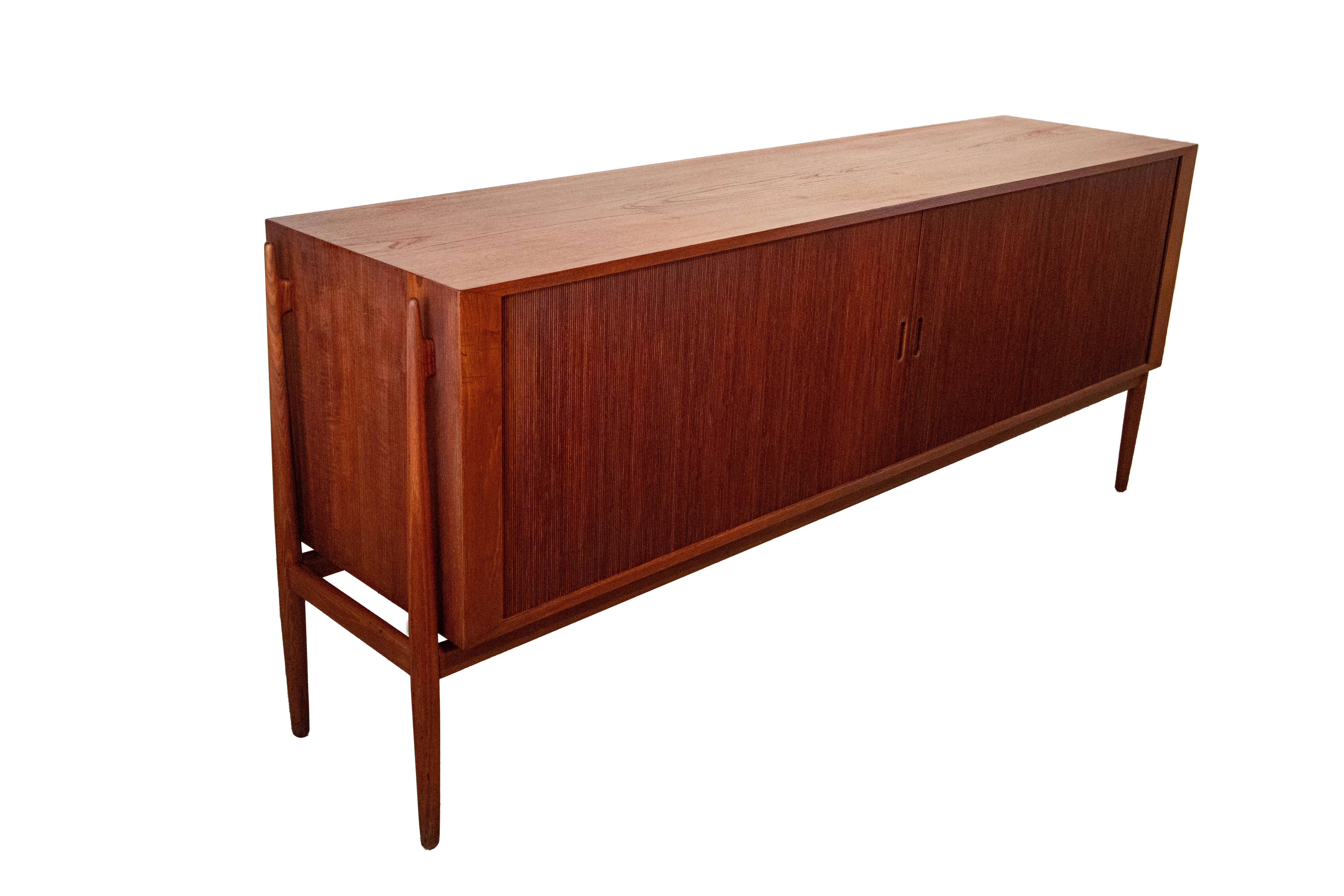A stunning sideboard from cabinetmaker Niels Vodder imported from Denmark by Illums Bolighus. This is a highly south after cabinet and rarely comes to market. This example from a single family owner on Long Island New York. The couple purchased the