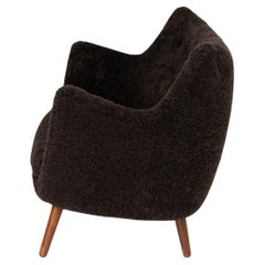 Niels Vodder produced poet sofa designed by Finn Juhl