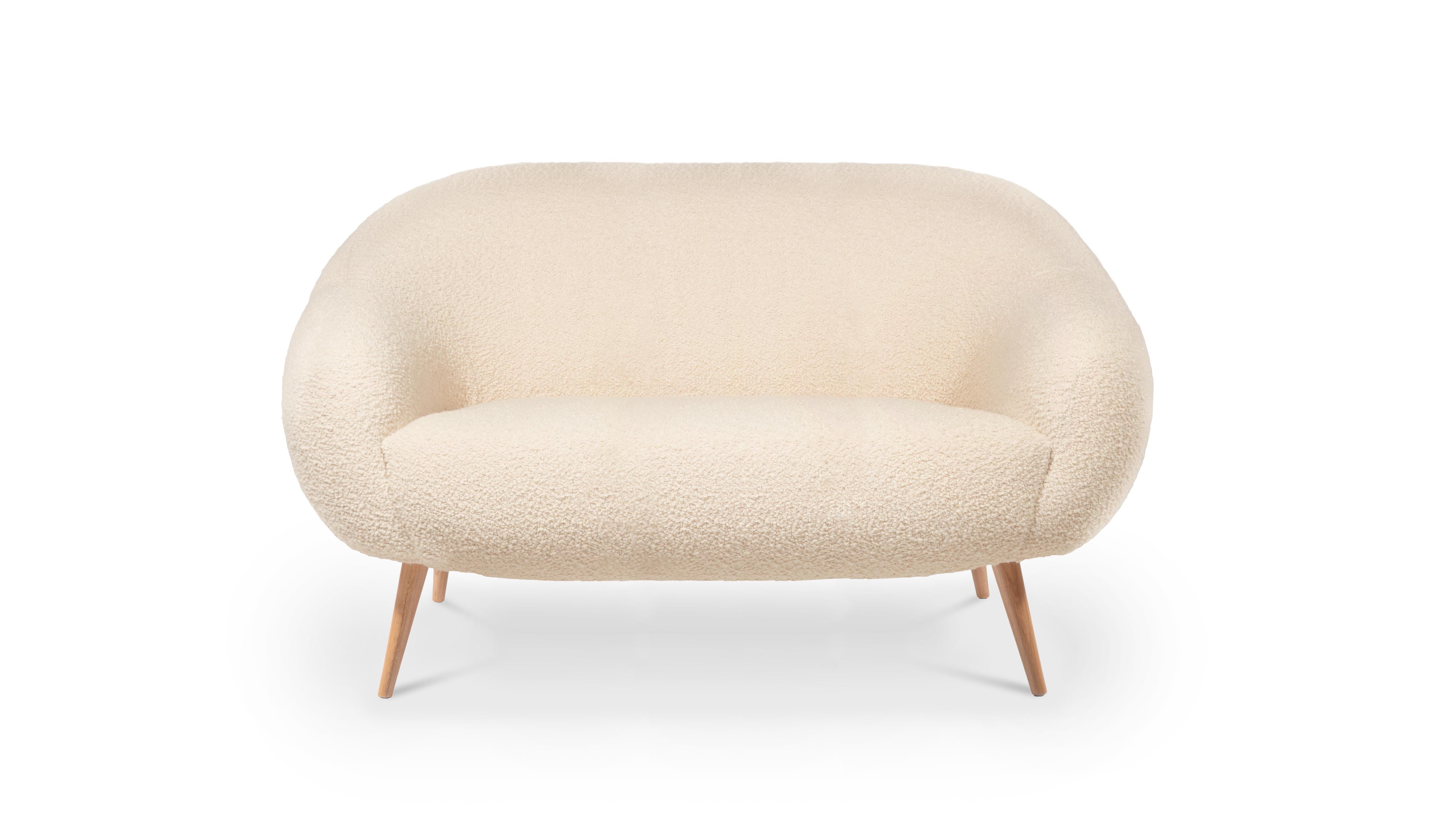 Niemeyer 2 Seat Sofa by InsidherLand
Dimensions: D 92 x W 180 x H 86 cm.
Materials: Oak, brushed brass, InsidherLand Woollen Ref. 1 fabric.
56 kg.
Available in different fabrics.

The Niemeyer sofa is named after the Brazilian Architect Oscar