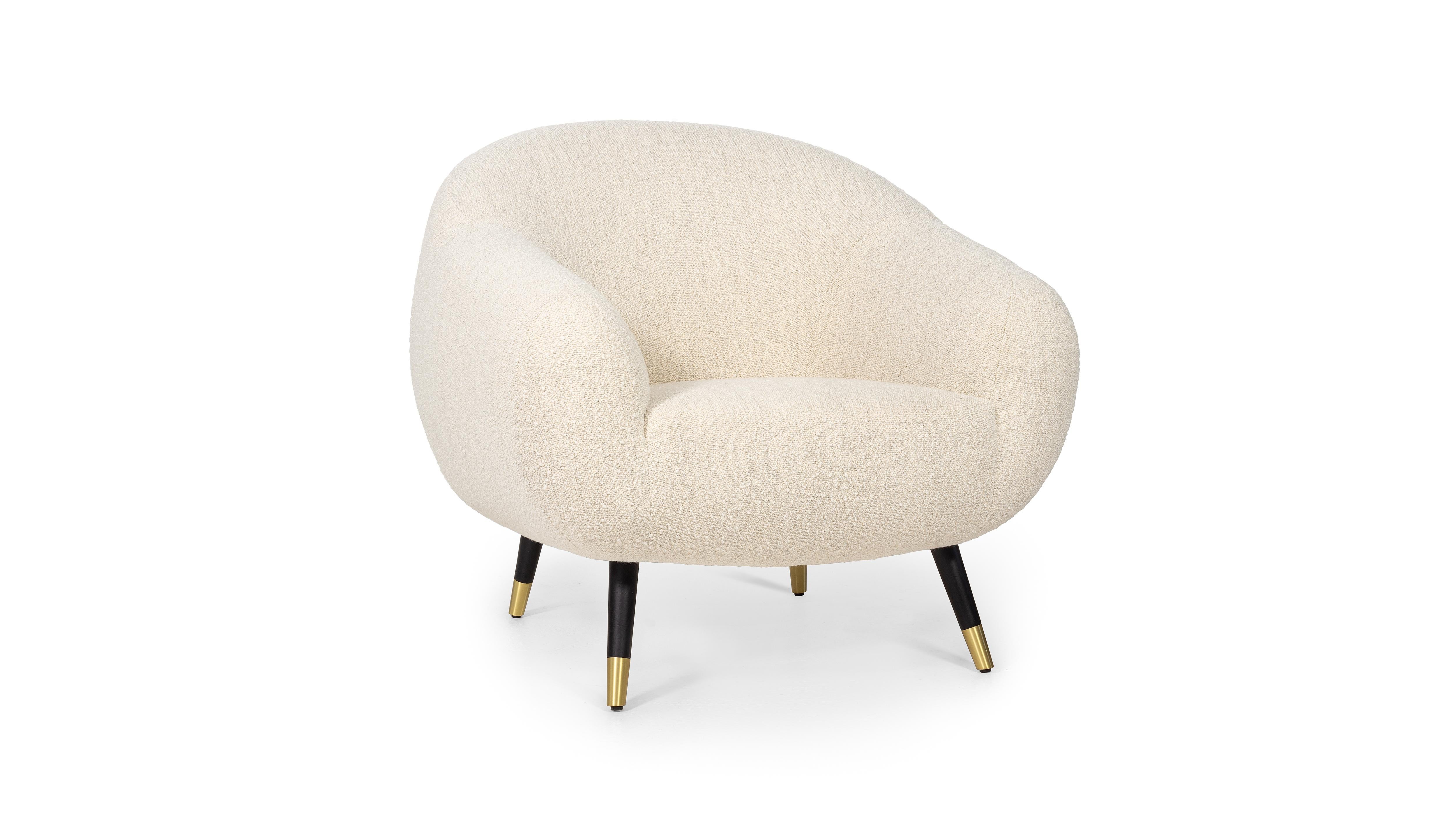 Niemeyer Brass Armchair by InsidherLand
Dimensions: D 92 x W 94 x H 86 cm.
Materials: Dark oak, brushed brass, InsidherLand Woollen Ref. 1 fabric.
32 kg.
Available in different fabrics.

The Niemeyer armchair is named after the Brazilian Architect