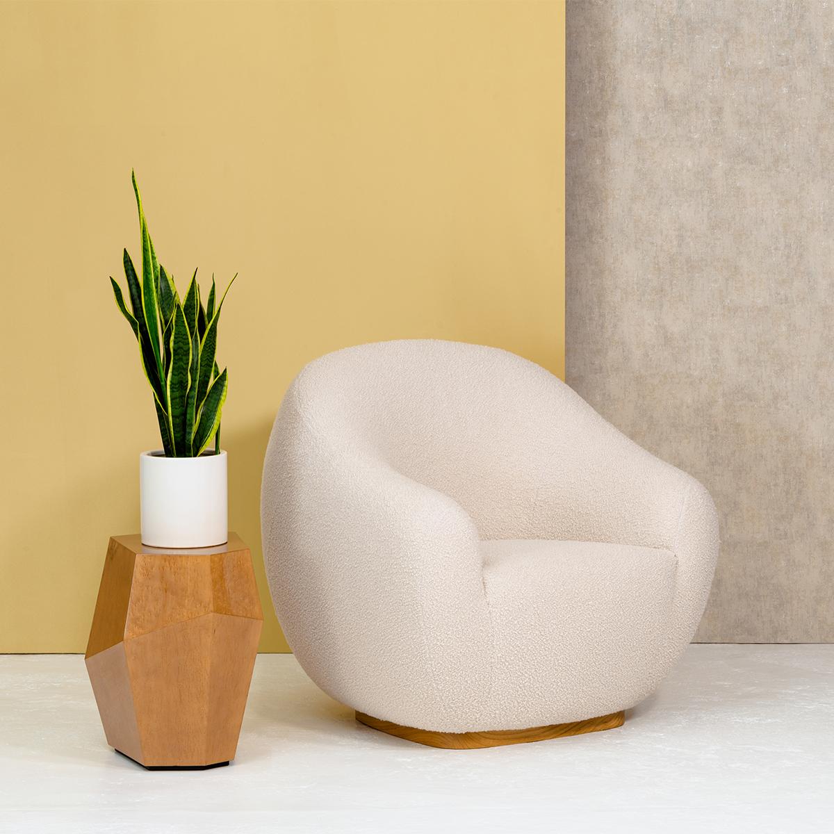 The rounded lines of this early 1950s style armchair are influenced by the 