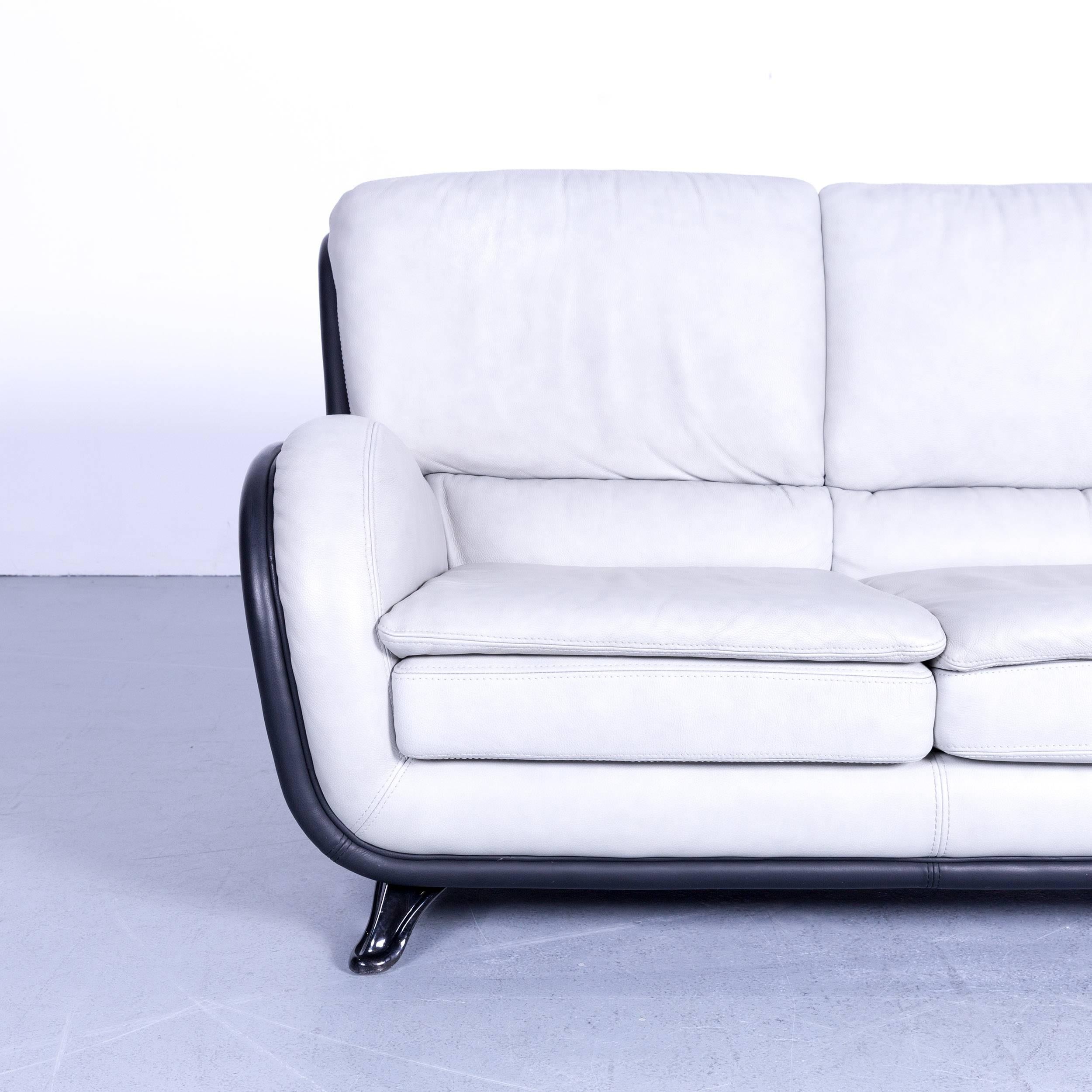 Nieri designer sofa made of leather in a minimalistic and modern design.