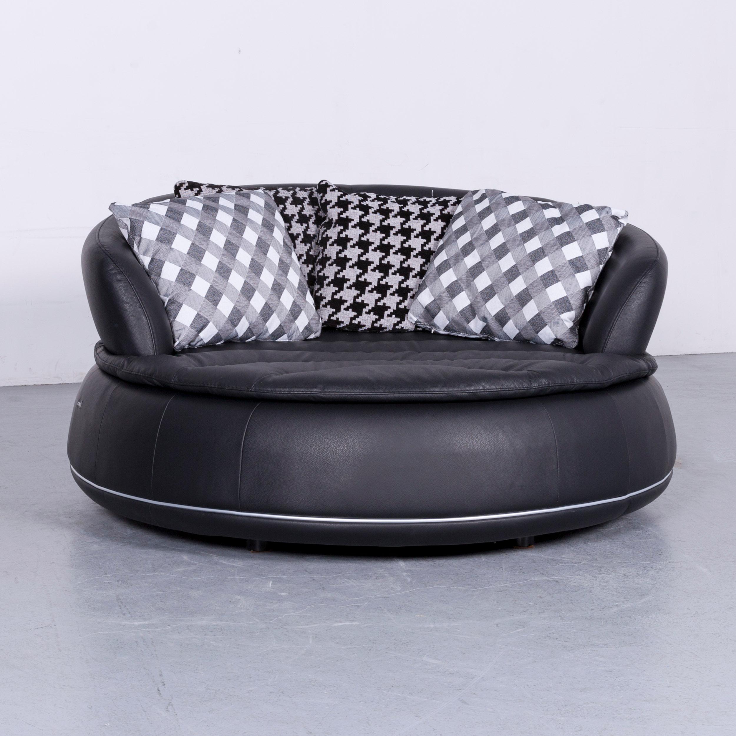 We bring to you a Nieri Espace loveseat designer sofa black two-seat round lounge couch.