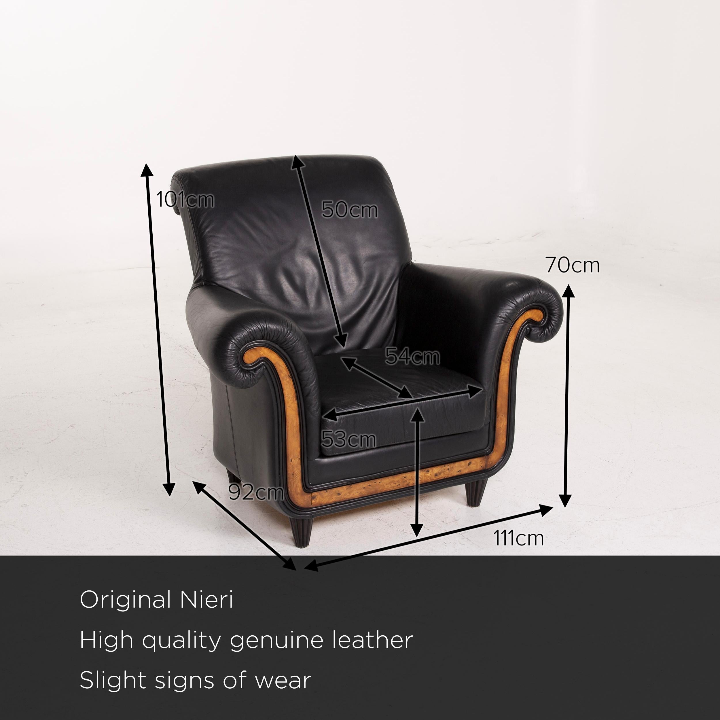 We present to you a Nieri leather armchair black.


 Product measurements in centimeters:
 

Depth 92
Width 111
Height 101
Seat height 44
Rest height 70
Seat depth 54
Seat width 53
Back height 59.
 