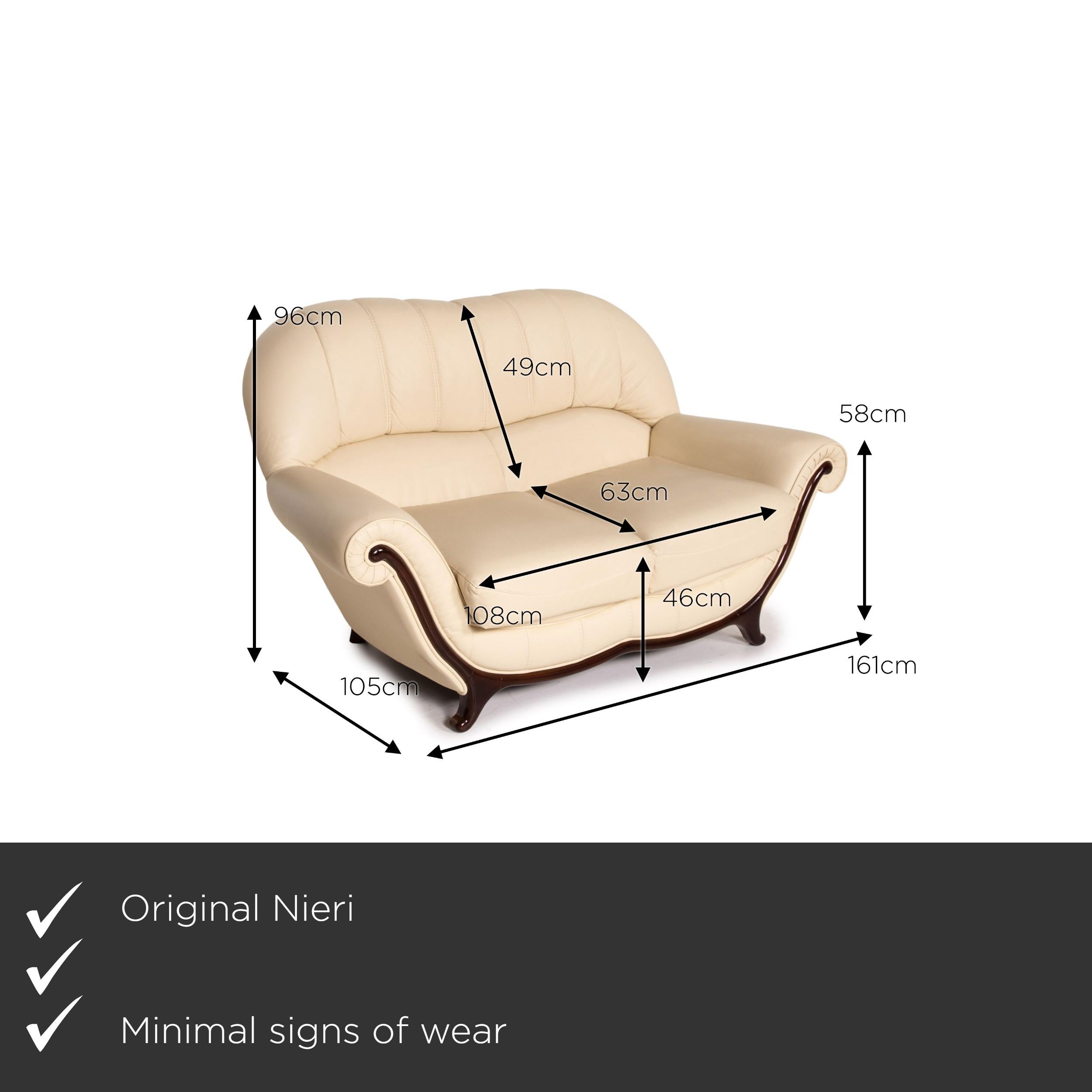 We present to you a Nieri leather wood sofa cream two-seater couch.
  
 

 Product measurements in centimeters:
 

Depth: 105
Width: 161
Height: 96
Seat height: 46
Rest height: 58
Seat depth: 63
Seat width: 108
Back height: 49.