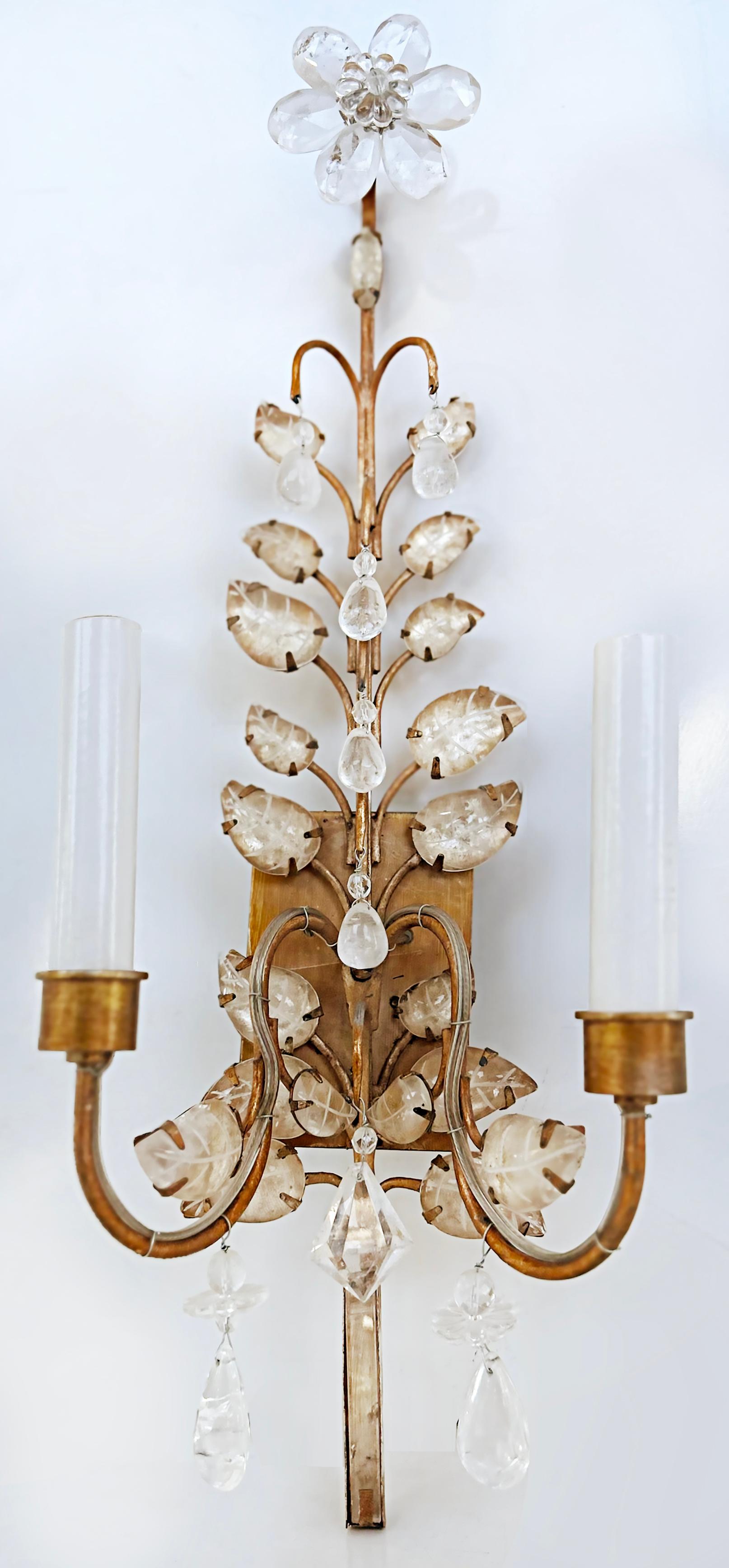 Niermann weeks rock crystal wall sconces, manner of bagues, pair.

Offered for sale is a pair of Niermann Weeks rock crystal wall sconces that were created in the manner of Mason Bagues. These traditionally styled sconces are French-wired to a