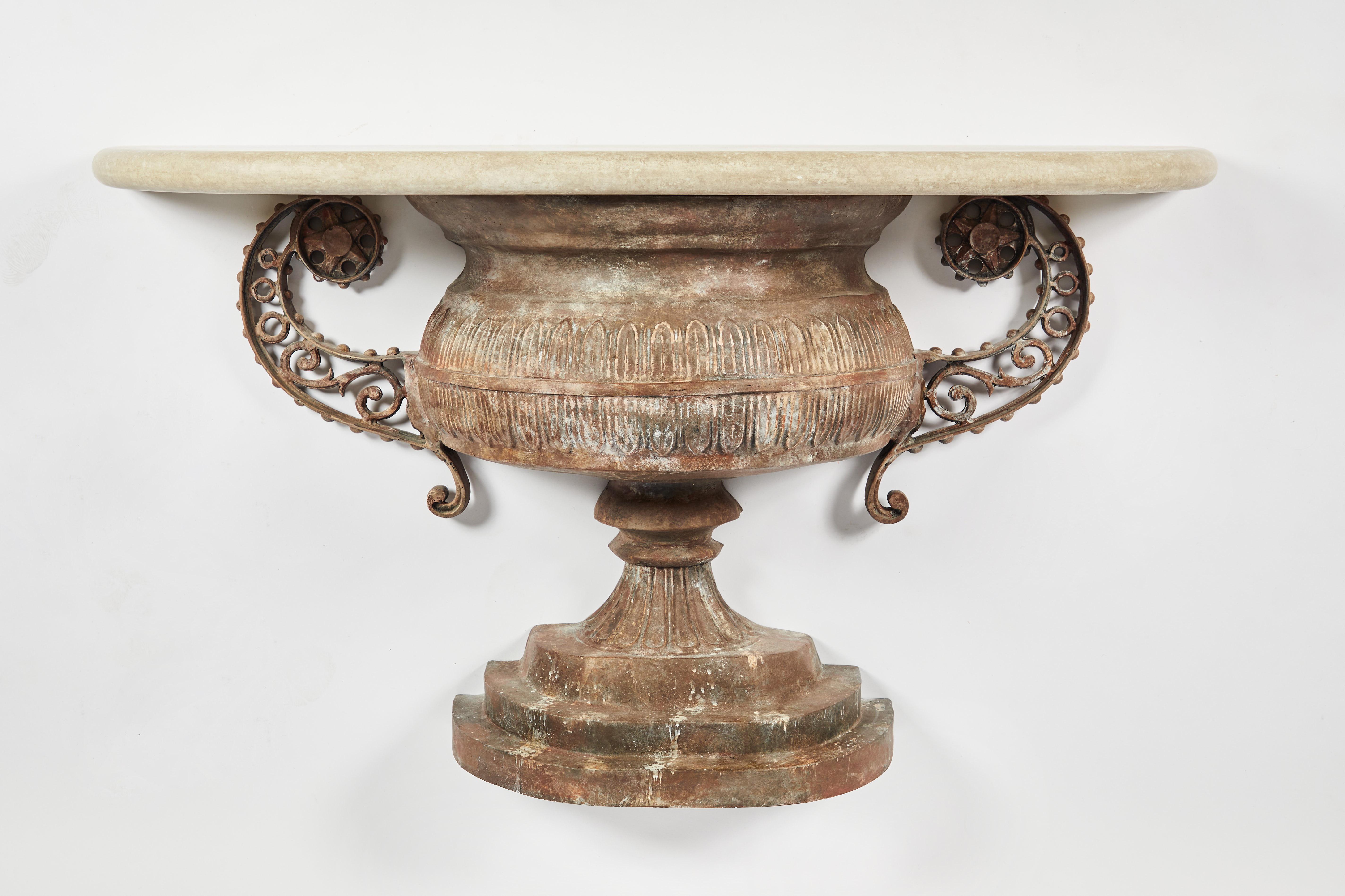 Maker: Niermann Weeks
Item: Tazza Urn console table
Materials: Cast concrete and Anglian iron.