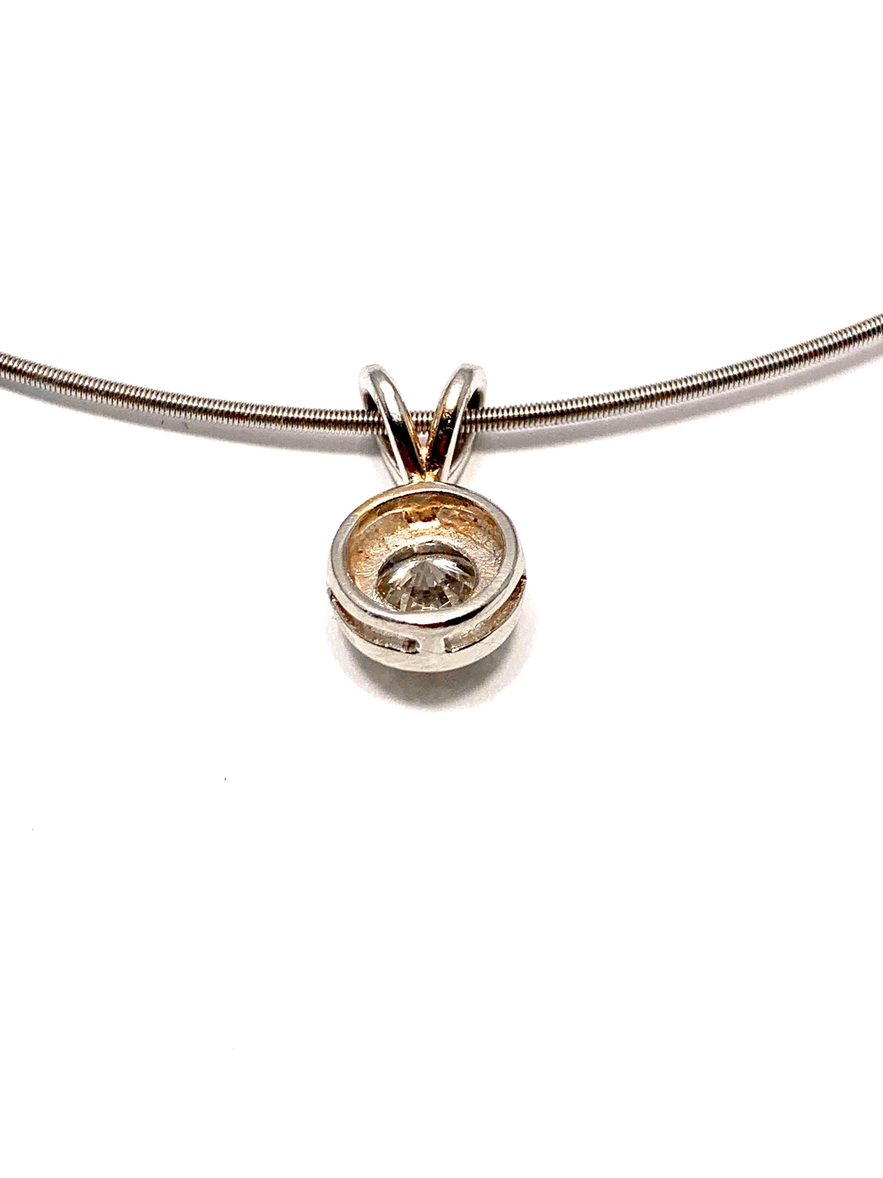 Women's or Men's Niessing 1.15 Carat Round Diamond Contemporary Platinum Necklace