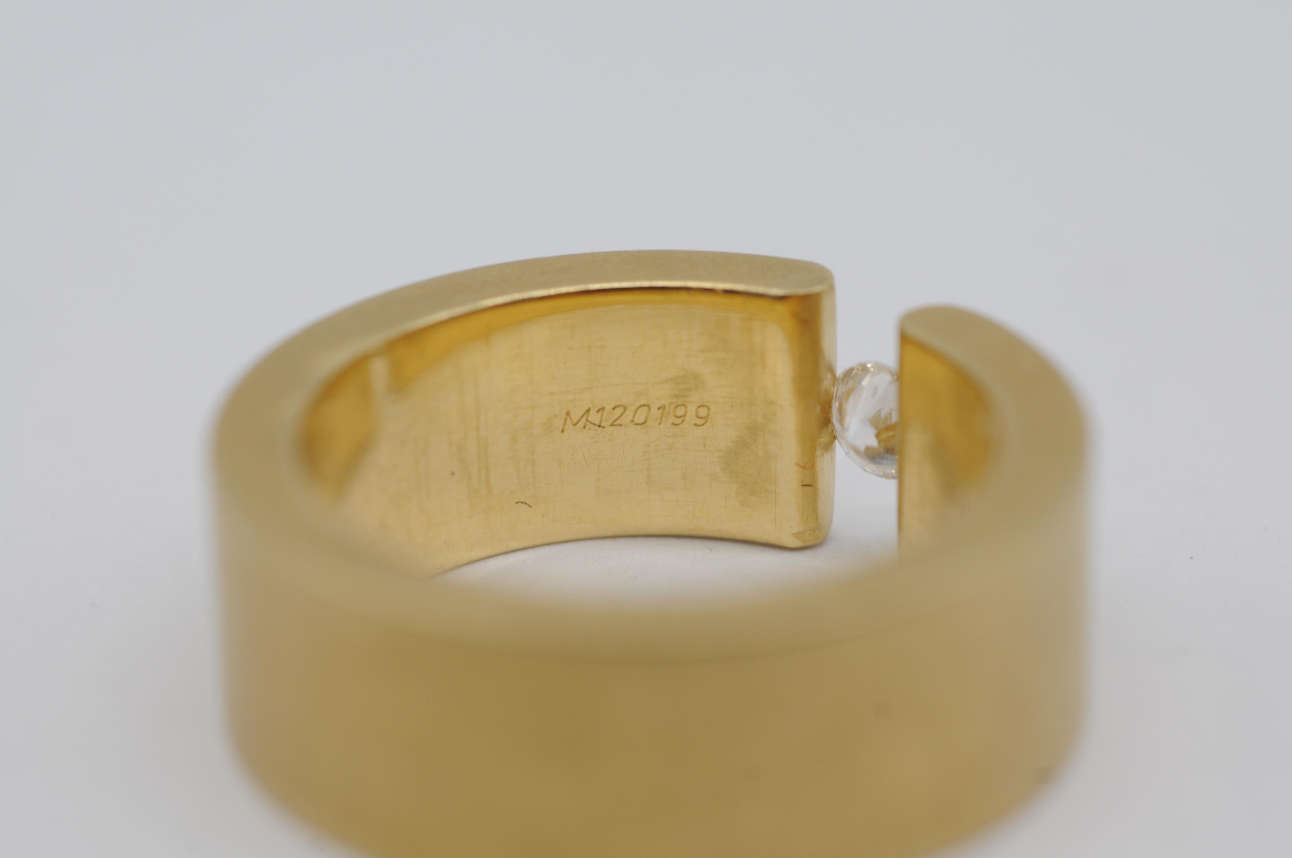 Niessing tension ring in 18k yellow gold with a brilliant For Sale 2
