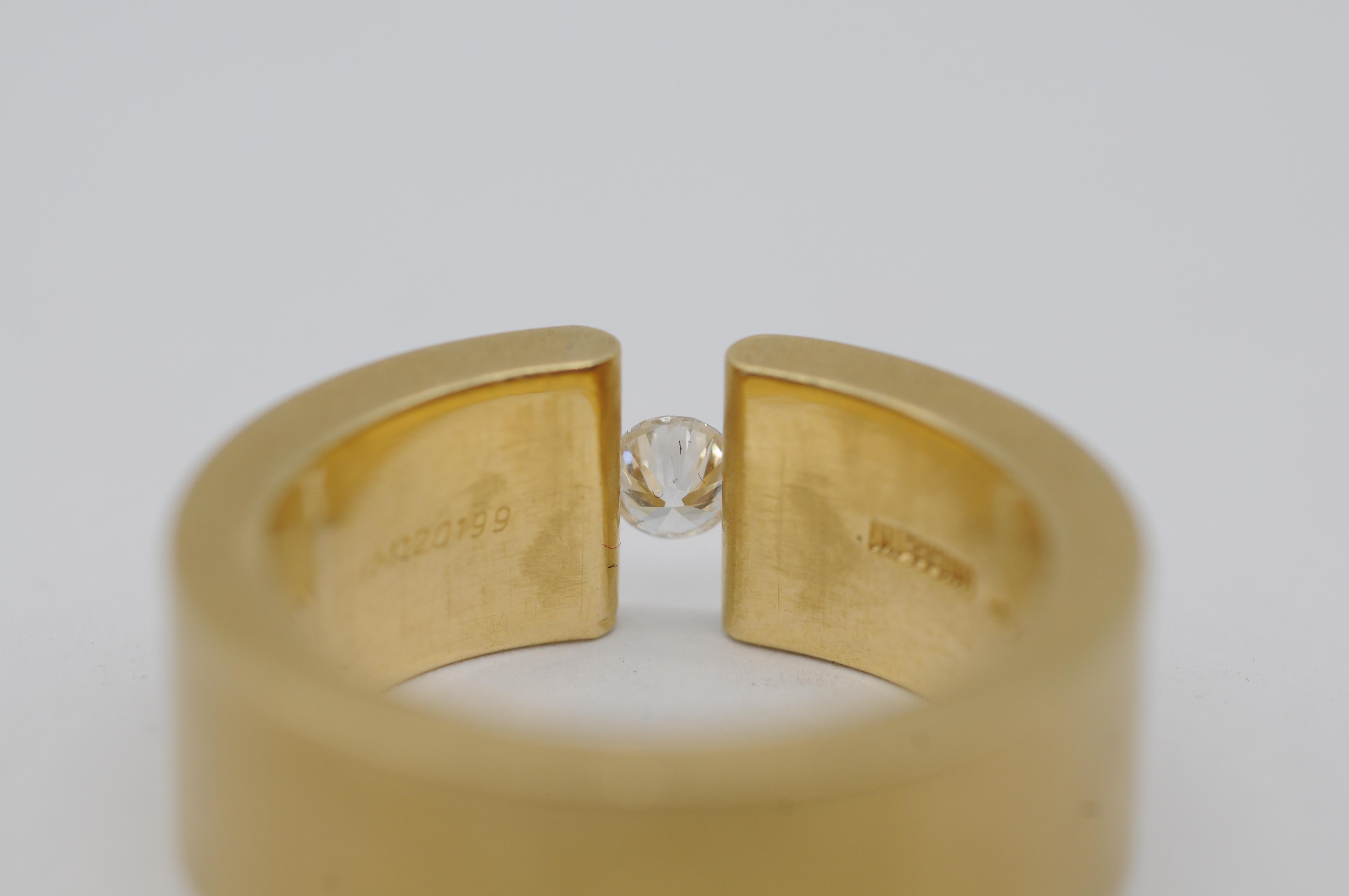 Niessing tension ring in 18k yellow gold with a brilliant For Sale 3