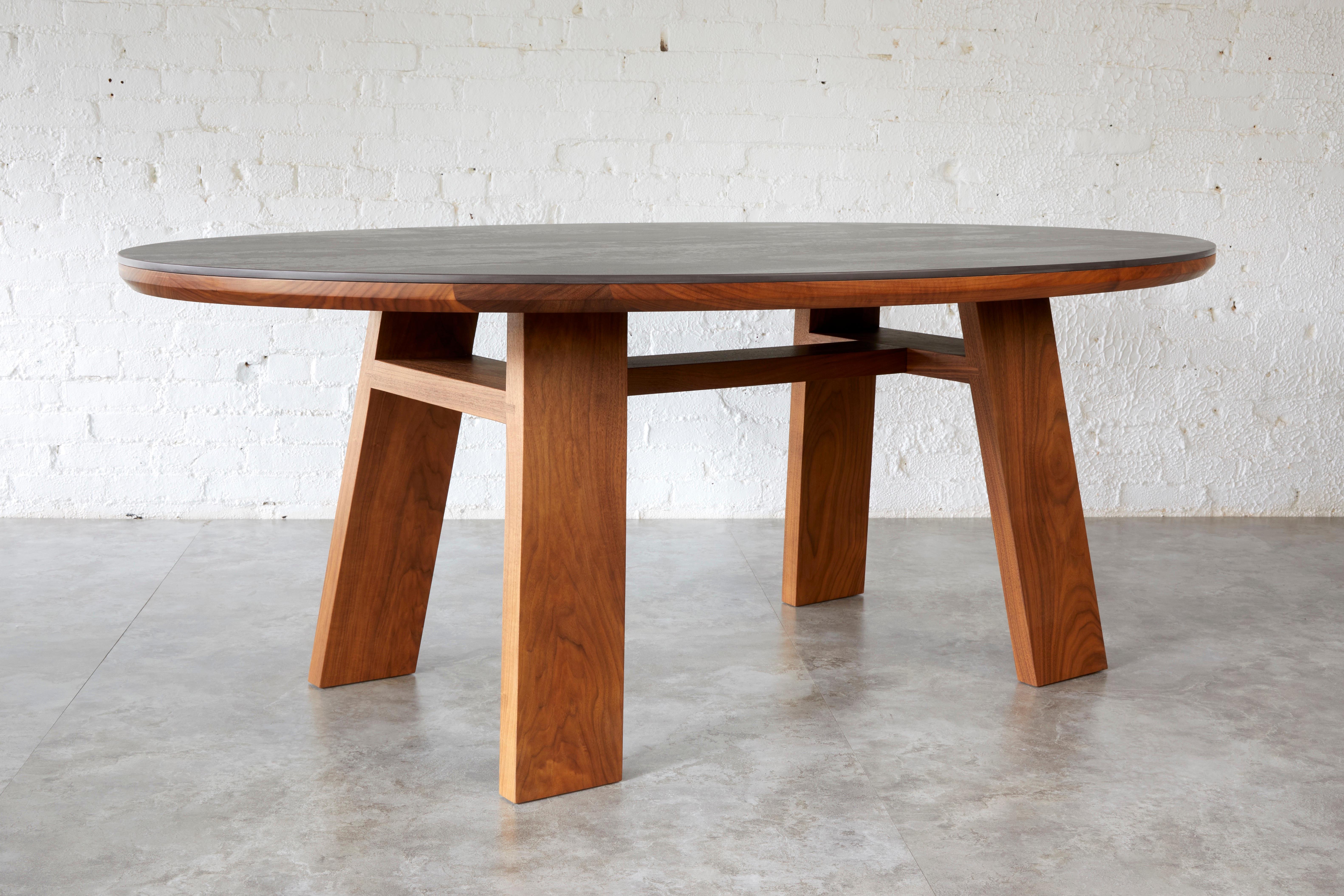 The Nieves table combines natural materials from two elements wood and stone to create an elevated table that stimulates the senses. Starting with solid wood that is sourced as close to home as possible, our designer Kirk Van Ludwig of Autonomous