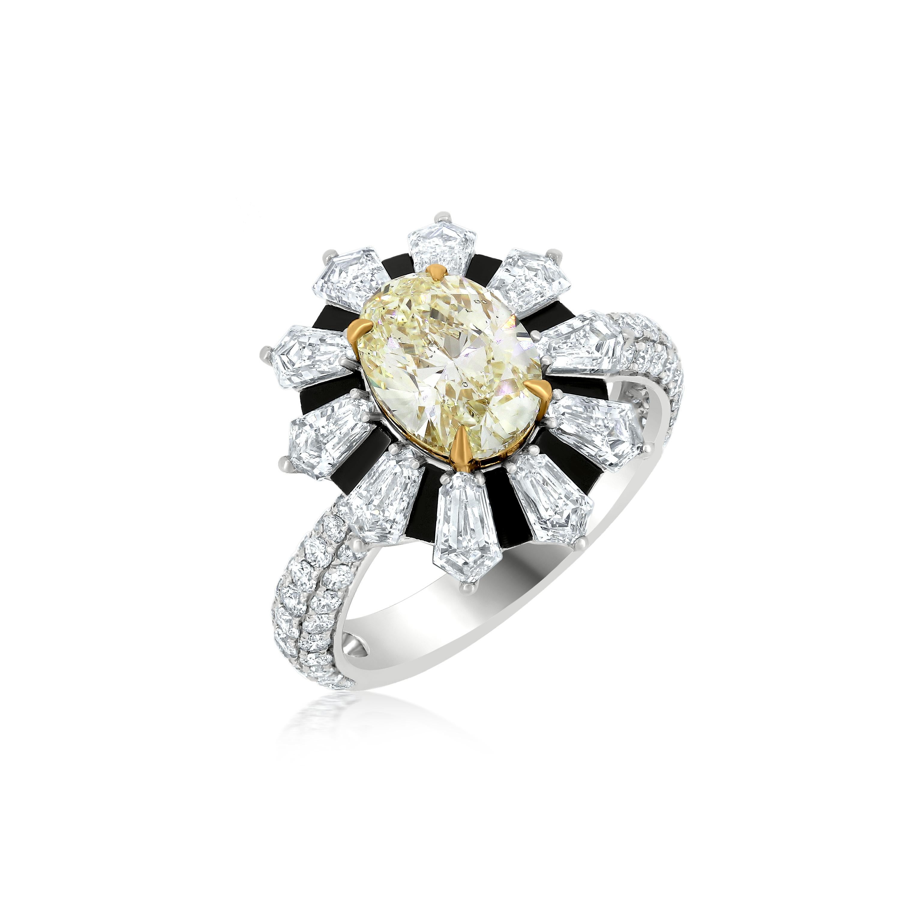 A 2.0 carats CGL certified oval yellow diamond prong set in yellow gold lends itself to a natural rising sun design. This master piece by Nigaam features an alternating Kite shaped diamonds and black enamel spread out form the center of the ring to