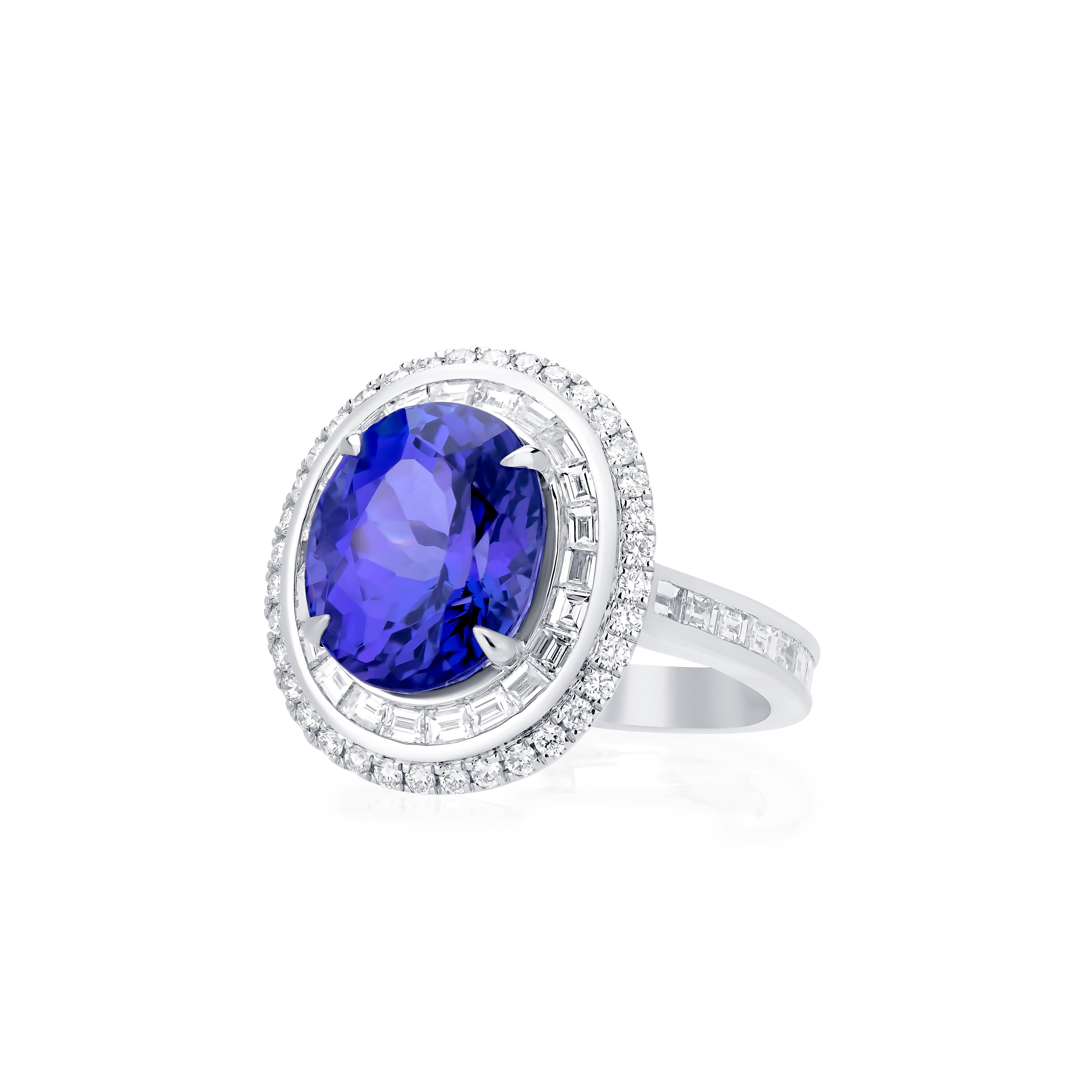Nigaam 5.41cts. Oval Tanzanite and 1.25Cts. Diamond Cluster Ring in 18k Gold In New Condition For Sale In New York, NY