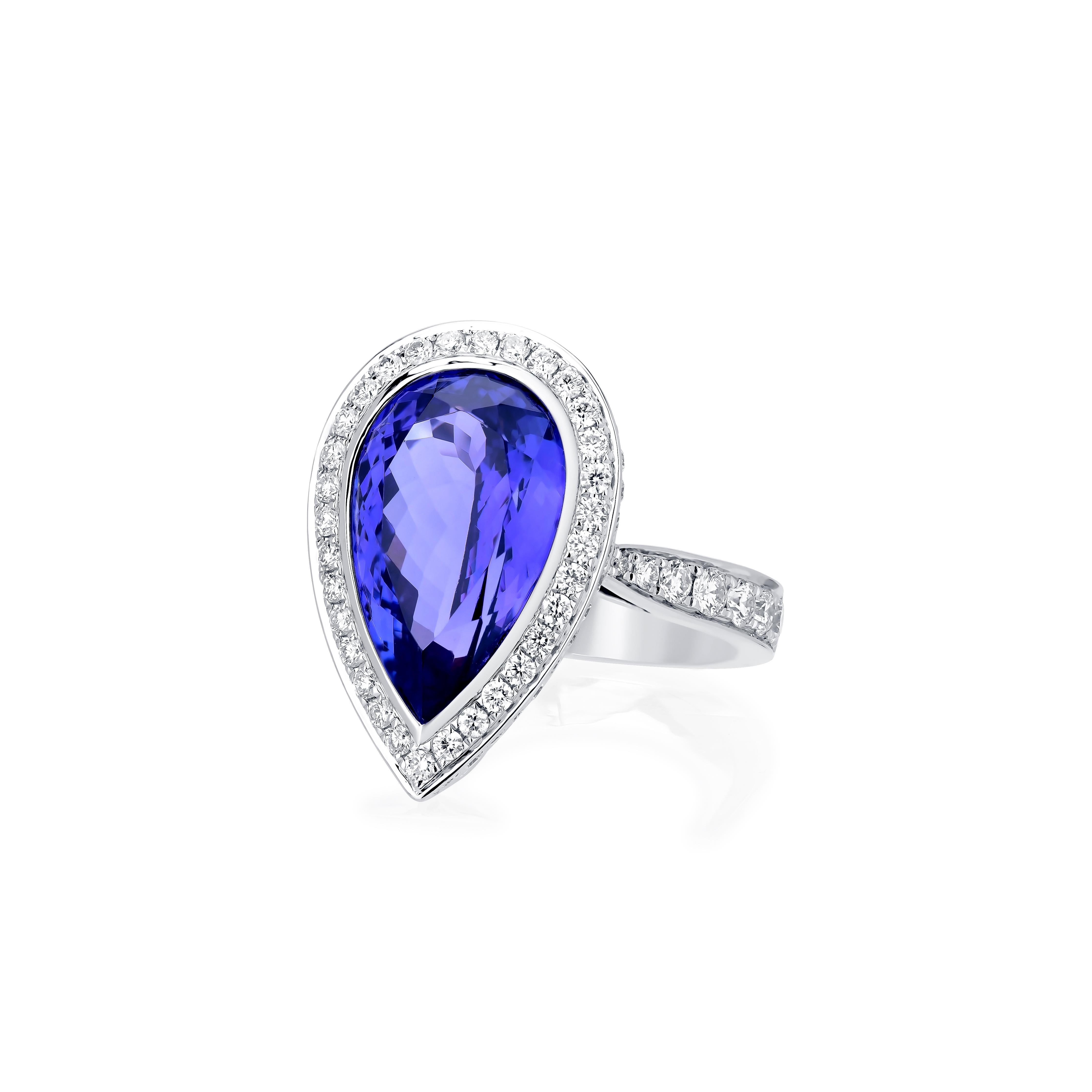 Nigaam 8.29cttw. Pear-Shaped Tanzanite and Diamond Halo Ring in 18k White Gold In New Condition For Sale In New York, NY