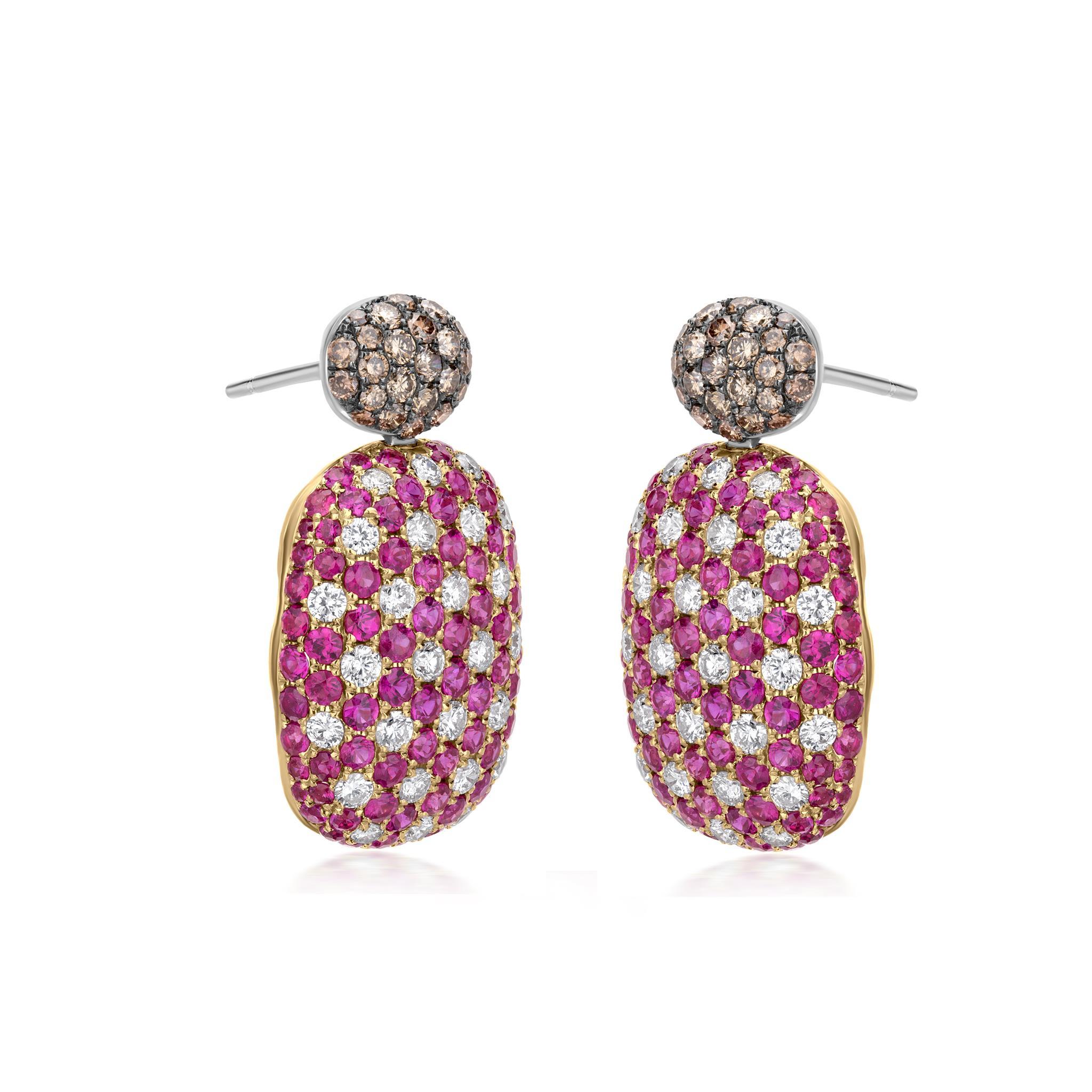 These stunning Nigaam 8.58 Cttw. Ruby & Diamond Stud Earrings are the perfect combination of sophistication and glamour. Set in 18K Yellow Gold with a black rhodium finish, these earrings will immediately draw attention to your face. The top of the