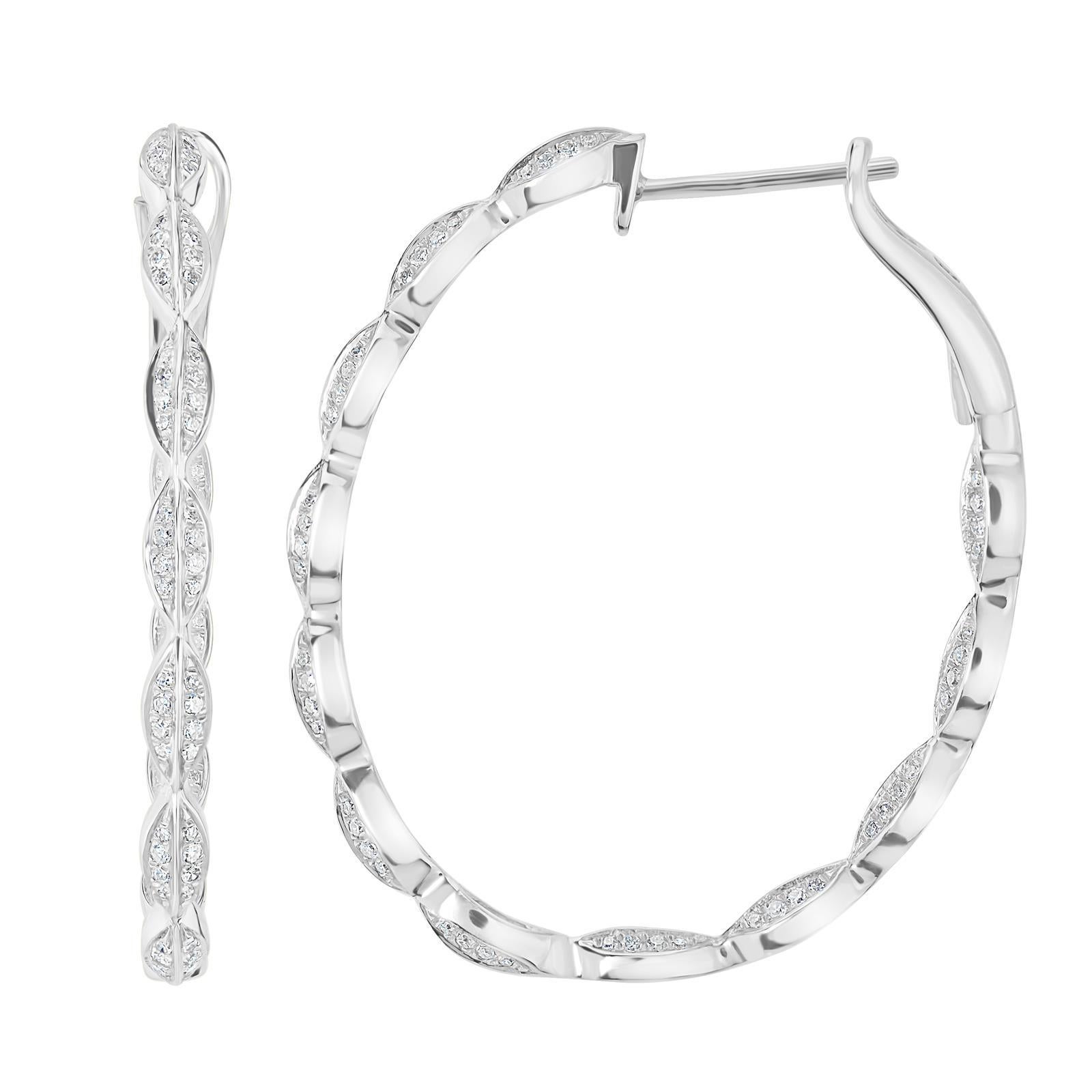 Elevate your everyday style with these exquisite 14K White Gold Diamond Hoop Earrings. The delicate, leaf curved design is adorned with sparkling round diamonds, each with a stunning GH color and SI1 clarity, creating a timeless and elegant piece.