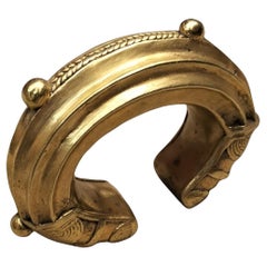 Bracciale nigeriano del XIX secolo in oro e bronzo con valuta commerciale