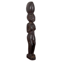 Nigerian Carved Female Figure in the Yoruba Ibeji Tradition