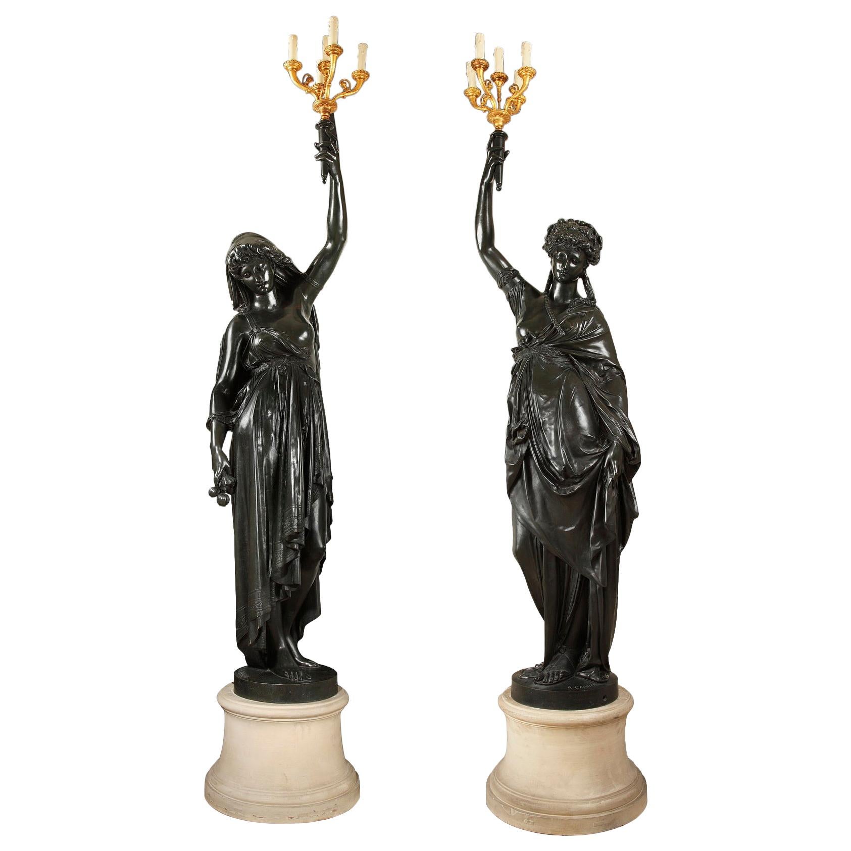 Pair of Bronze Torchères by E.Colin after a Model by A.Carrier, France, c. 1900 For Sale