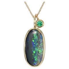 Night Becomes Ihre Smaragd- und Opal-Halskette aus 14k Gold von NIXIN Jewelry