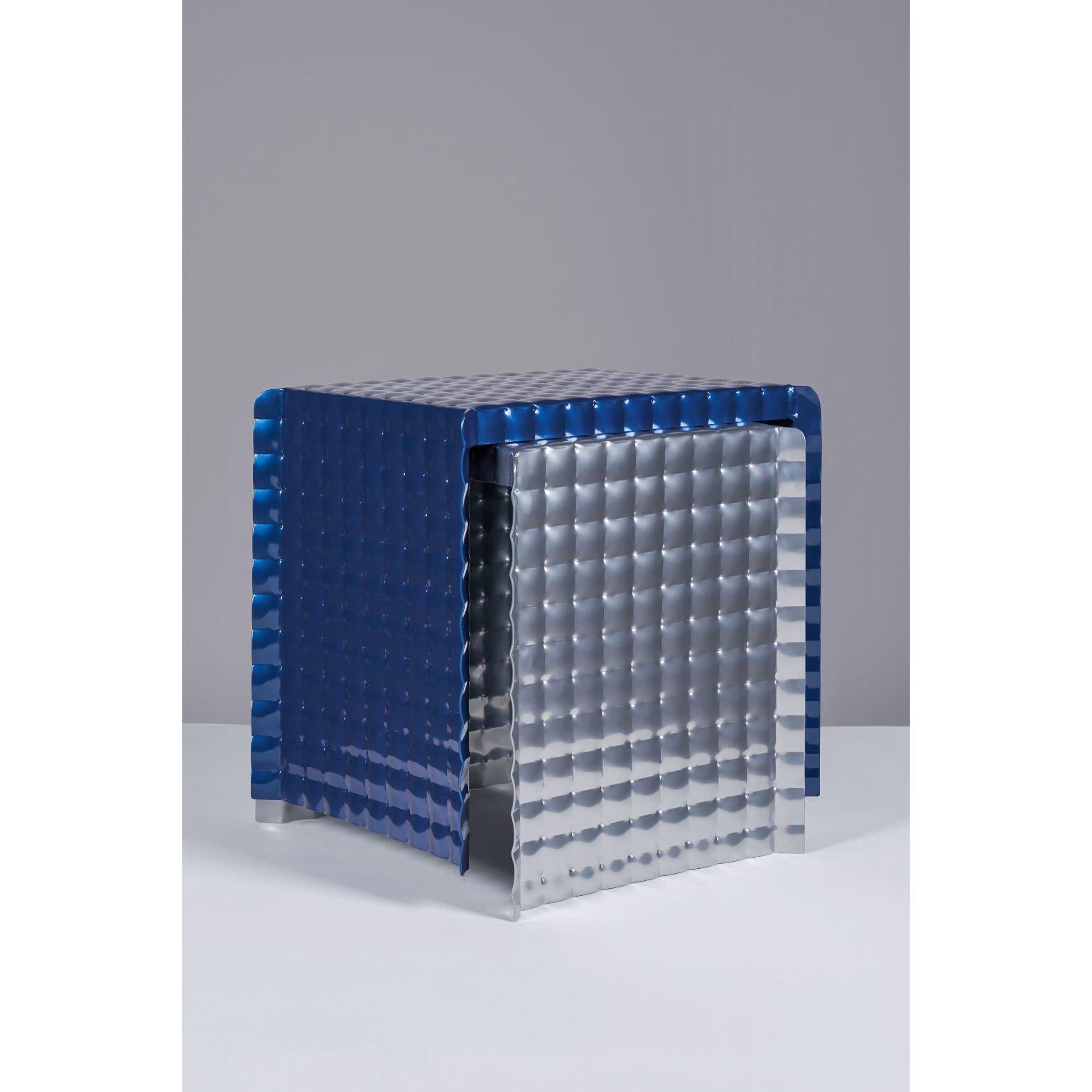 Night blue pressure stool by Tim Teven
Pressure Series (2018 - Ongoing)
Dimensions: 37 x 30 x 39 cm
Materials: Aluminium, powder coating

Also available: Silver/ chrome.

In the pressure series, Tim Teven uses material deformation under