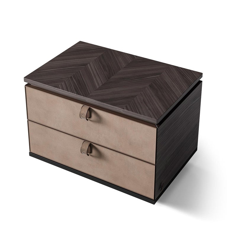 The simply stylish night side table is characterized by the nubuck leather drawers, adding elegance to a classic design. Featuring a veneered inlay top and a sturdy wooden base, the drawers will beautifully compliment your any contemporary style