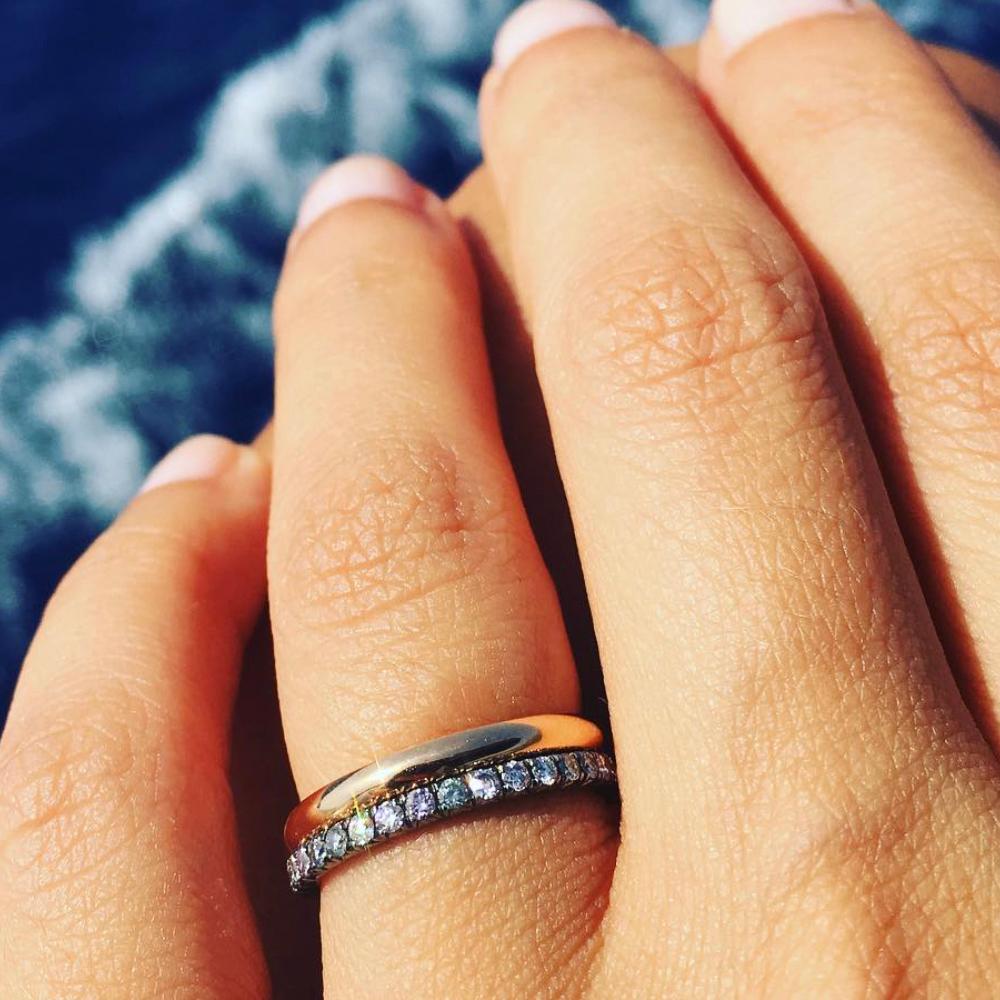 A subtle color contrast of white, grey and pink pavé diamonds set in black rhodium-plated 14k white gold recall a cloudy sky just shy of storming. We love SELIN KENT's Night Sky ring as an alternative wedding band, or to add the perfect amount of