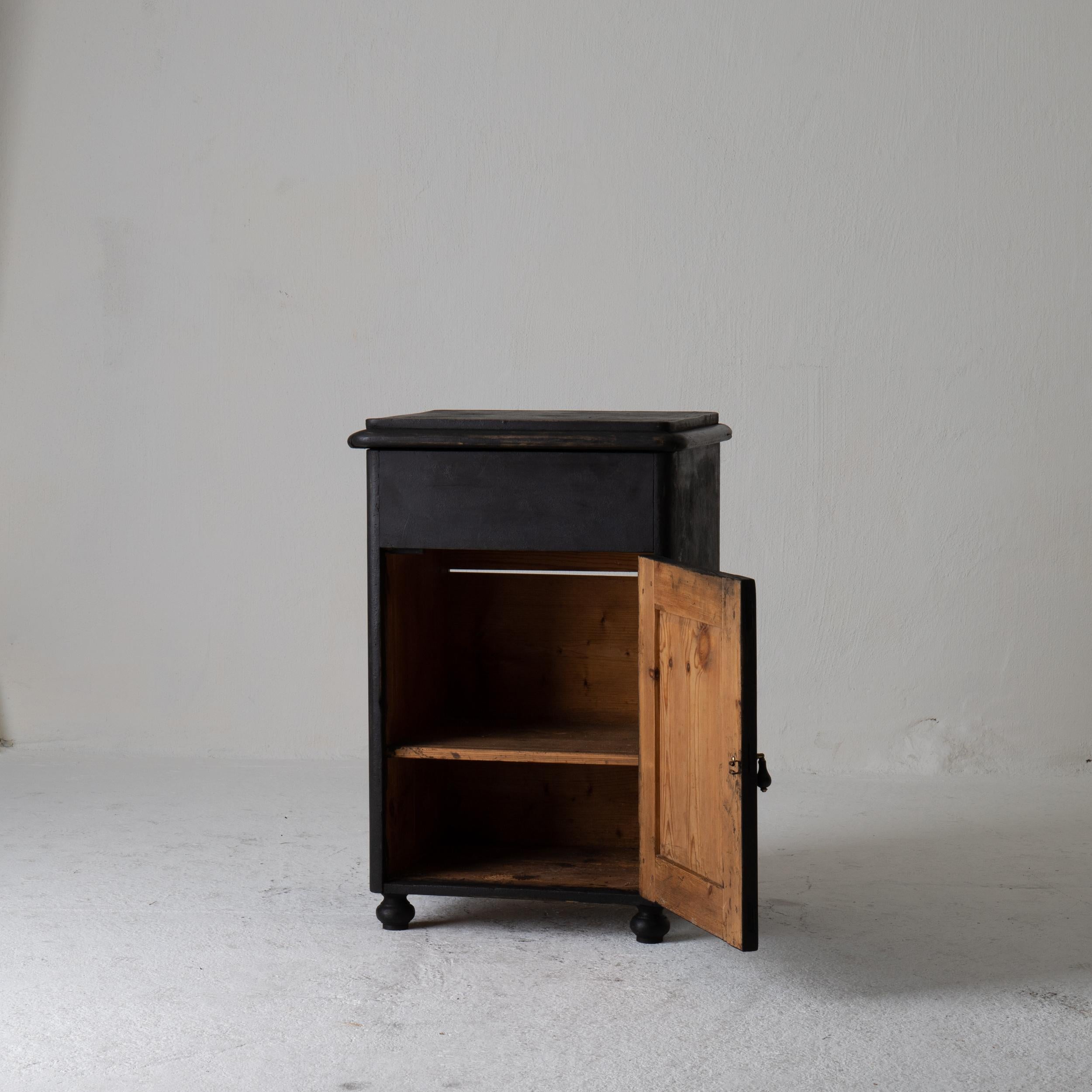 Nightstand Swedish black 19th century Sweden. A nightstand made during the 19th century in Sweden. Painted in our Laserow black. Interior with shelf. Contemporary hardware.
  
 