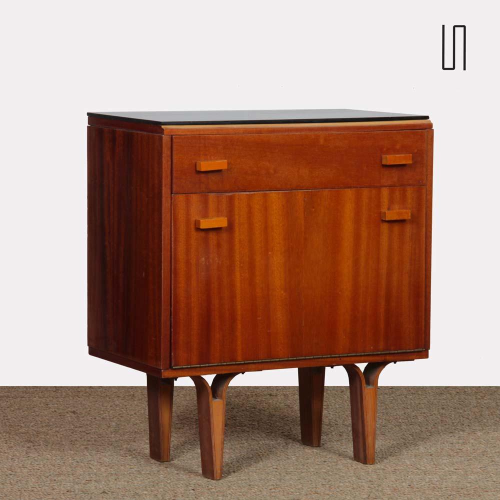 This night table is edited by Novy Domov in the 1970s. The structure is in wood and the top in opaline. This furniture is in good vintage condition.
