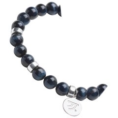 Bracelet nuit en argent avec œil de faucon noir