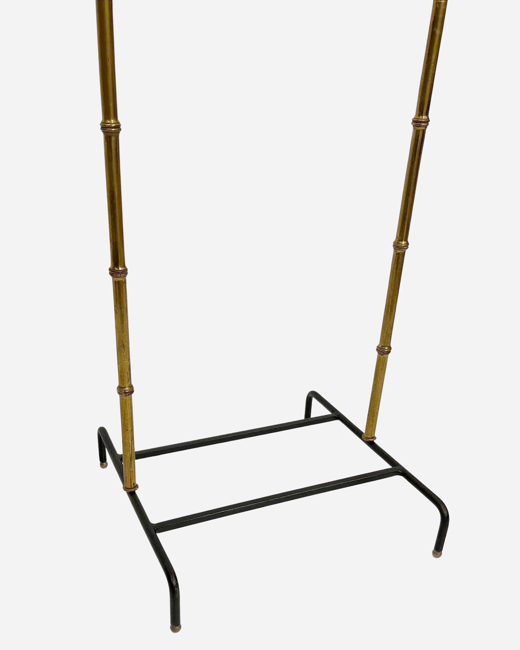 Mid-20th Century Night valet in turned brass and black leather by J. Adnet, France circa 1950 For Sale