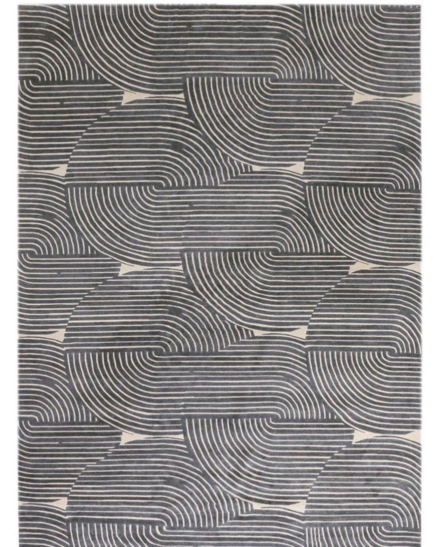 Nightcap rug by Art & Loom
Dimensions: D 243.4 x H 304.8 cm.
Materials: New Zealand wool & Chinese silk
Quality (Knots per Inch): 100
Also available in different dimensions.

Samantha Gallacher has always had a keen eye for aesthetics, drawing