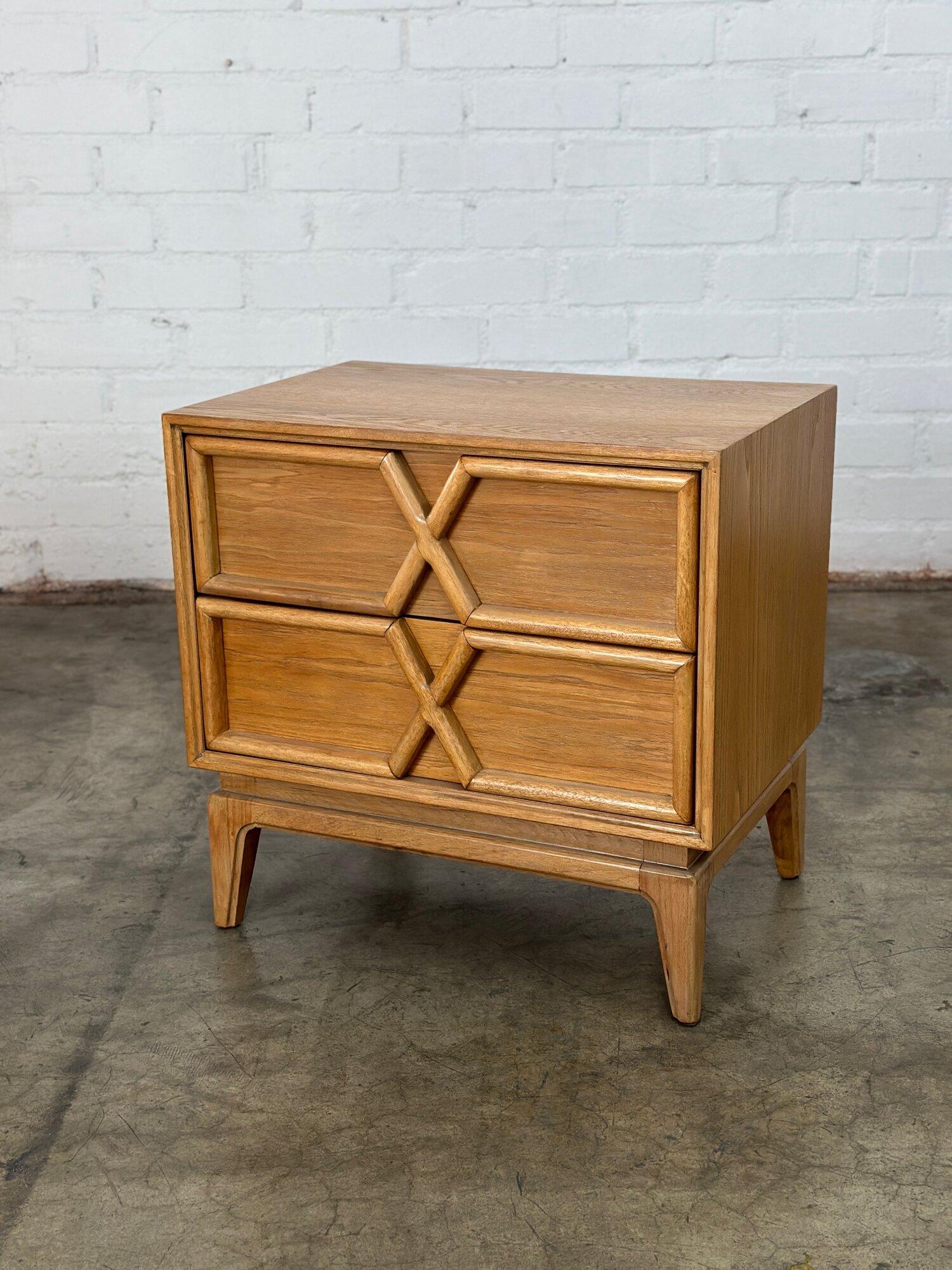 W24 D16 H23.25

1970’s fully refinished nightstands by American of Martinsville. Each nightstand features two drawers with an X design on the face. 

Price is for the pair*