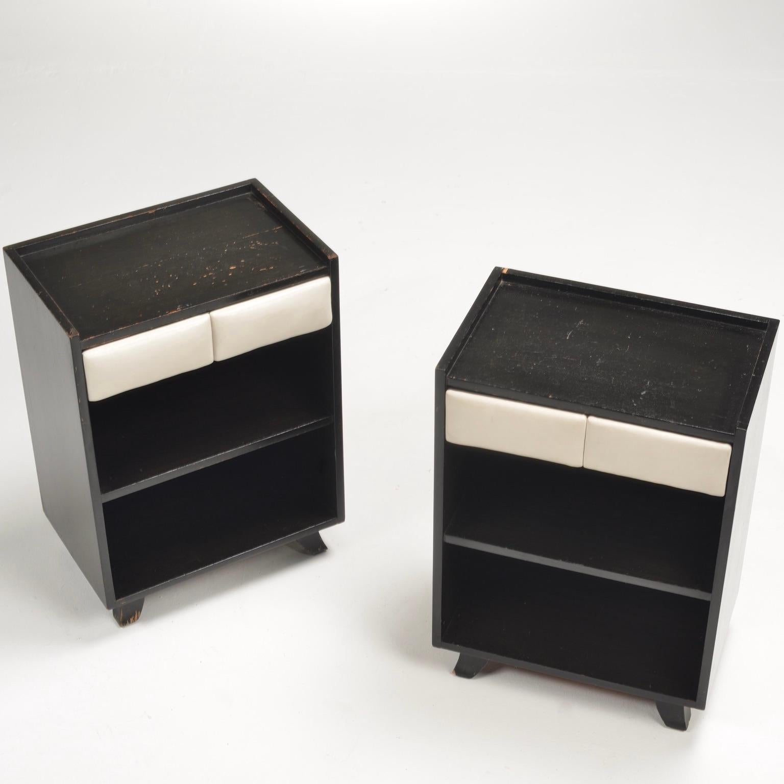 Made of original vinyl and mahogany. Tagged. This is a very rare example from Gilbert Rohde who saved the Herman Miller furniture company with his idea to make furniture for the modern home.

Please note: price includes both night stands