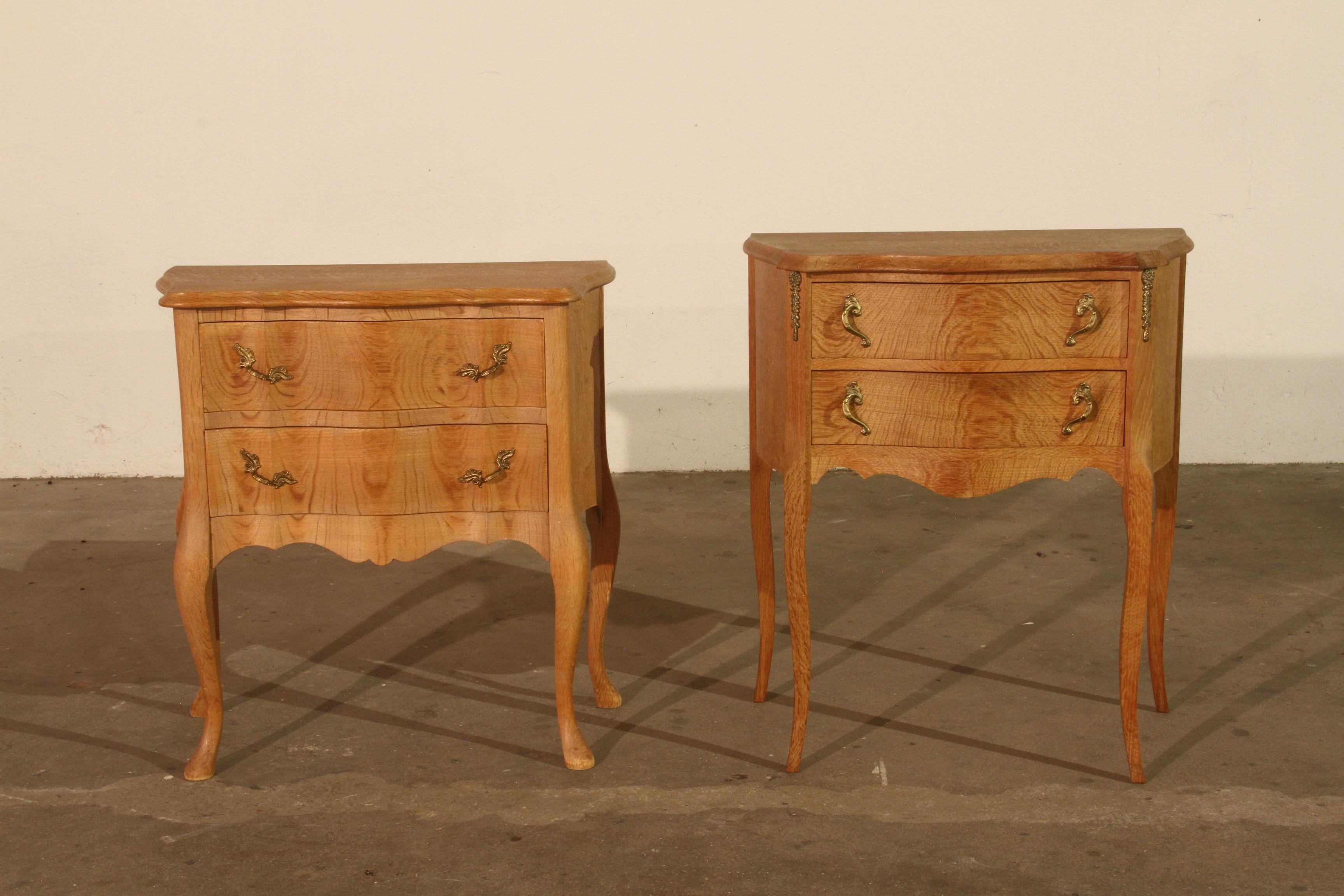 A charming pair of vintage 1960s acid-treated light oak bedside tables from Denmark. Though not identical, they beautifully complement each other, with slight differences in design adding to their character. One table is lower and slightly wider,