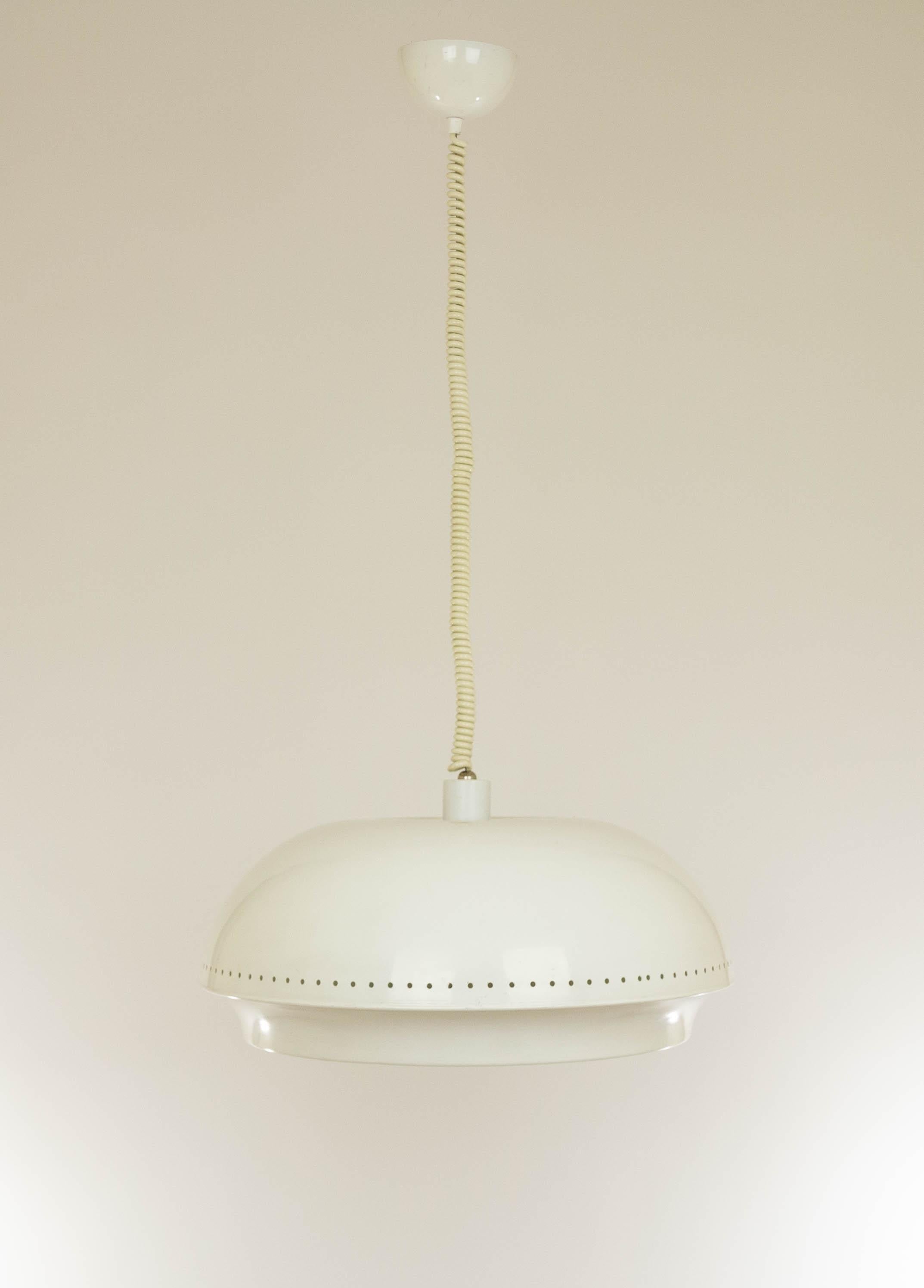 White Nigritella pendant designed by Tobia and Afra Scarpa for Italian Lighting manufacturer Flos in 1961.

This Nigritella pendant consists of a metal cap with in the middle a row of perforations forming a luminous decoration, a circular grate