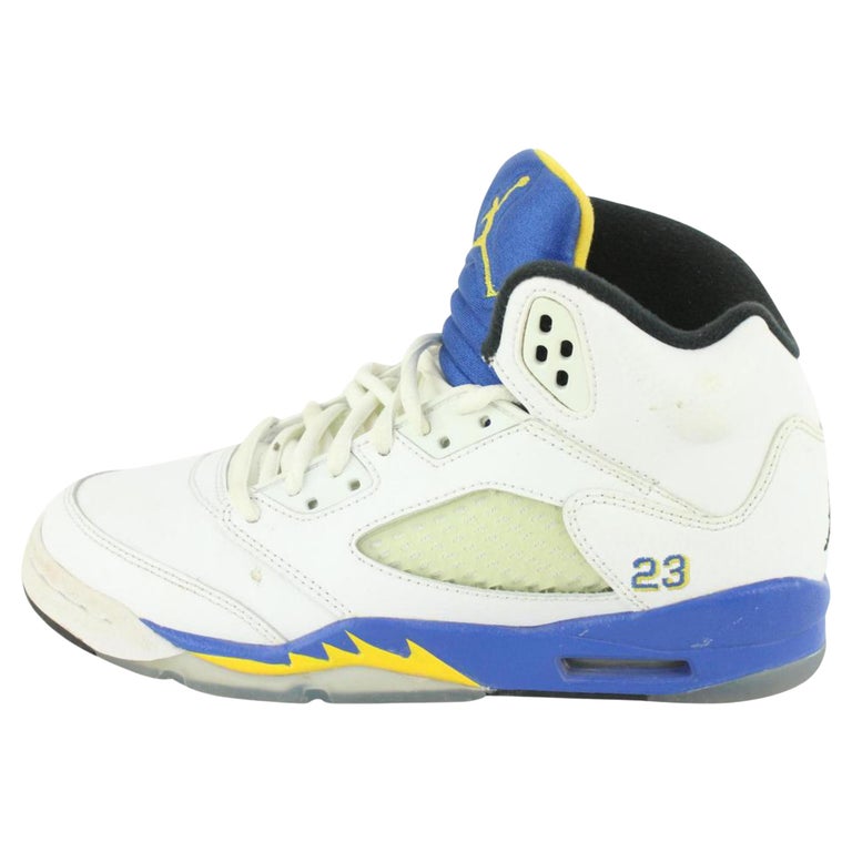 blue and yellow jordans 5