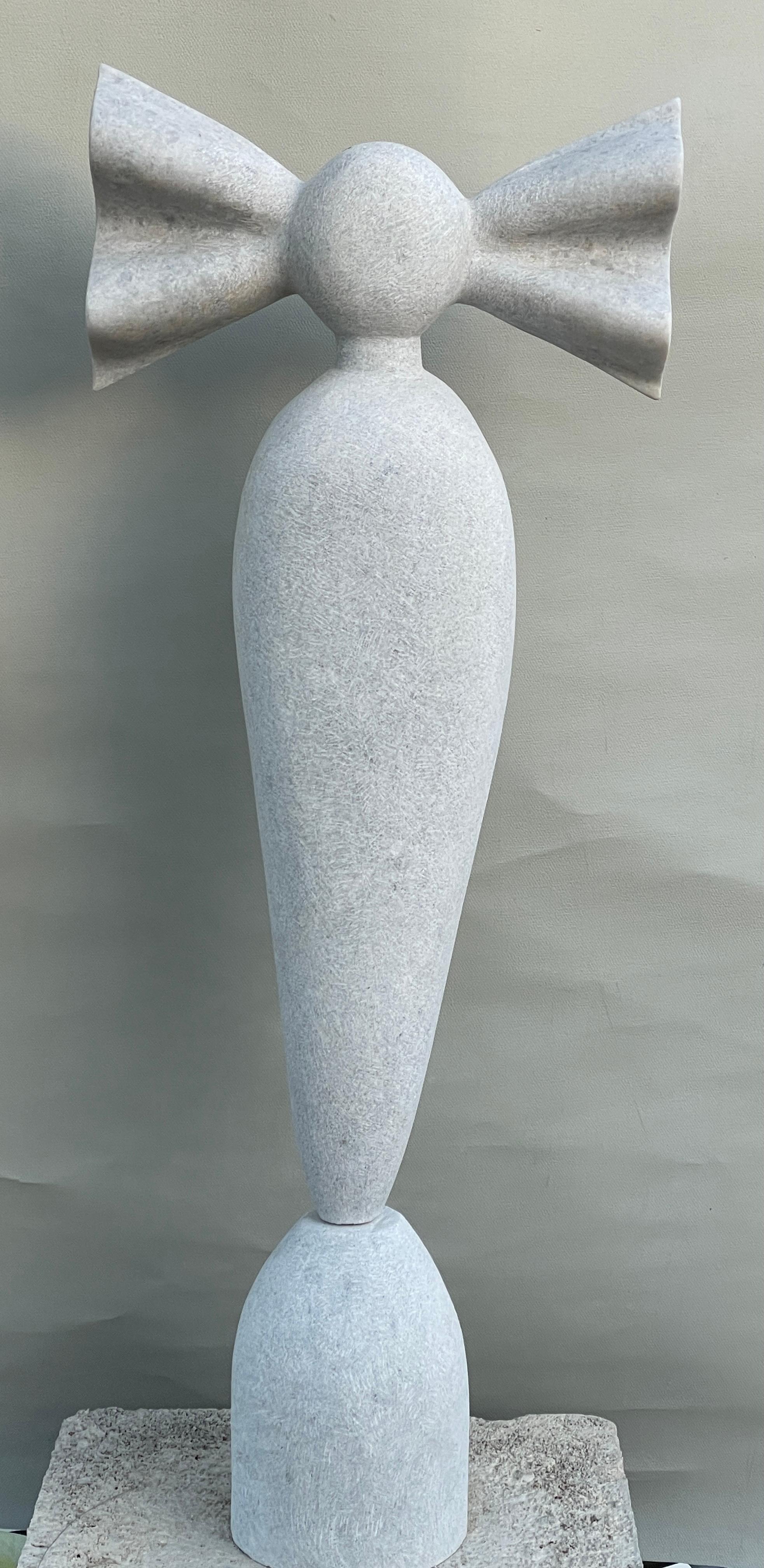 Nike hand carved marble sculpture by Tom Von Kaenel.
Dimensions: D 17 x W 41 x H 106 cm.
Materials: marble.

Tom von Kaenel, sculptor and painter, was born in Switzerland in 1961. Already in his early childhood he was deeply devoted to art. His