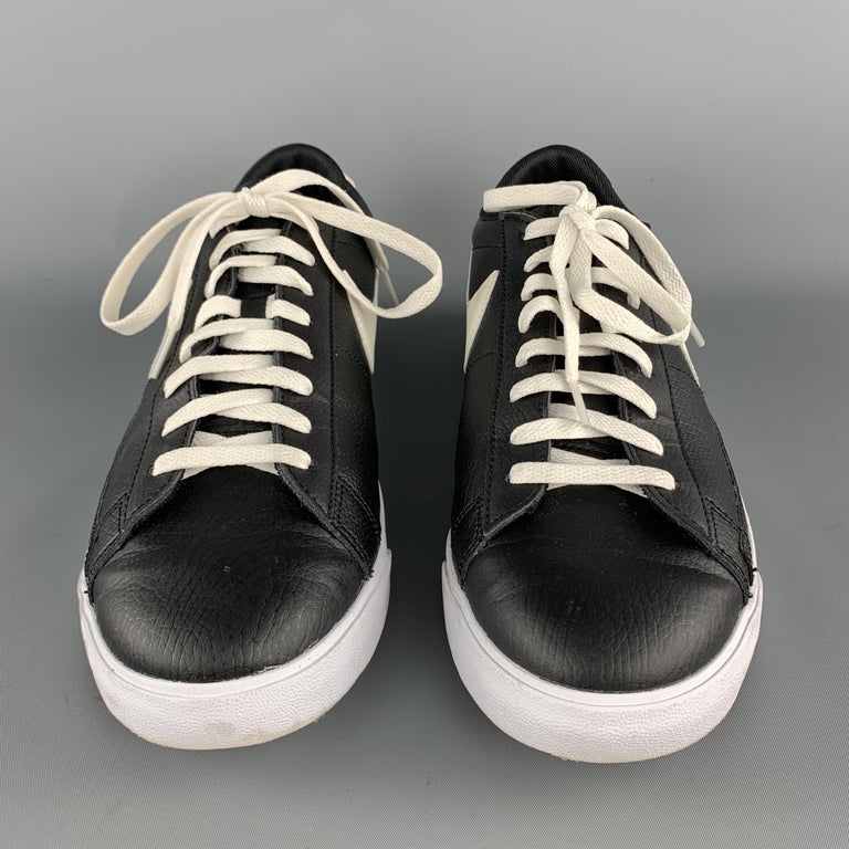 NIKE Size 11.5 Black and White Leather Lace Up White Sole Sneakers at ...