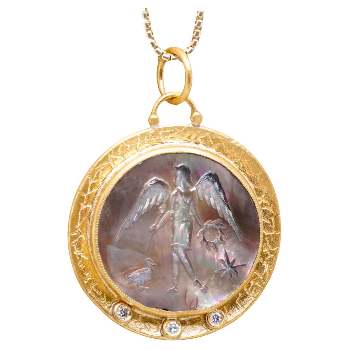 Nike, Winged Goddess of Victory, Carved in Mother of Pearl, Framed Pendant Necklace with Three Diamonds, 24kt Gold and Silver by Prehistoric Works of Istanbul, Turkey. These pendants look great alone or paired with other coin pendants or with