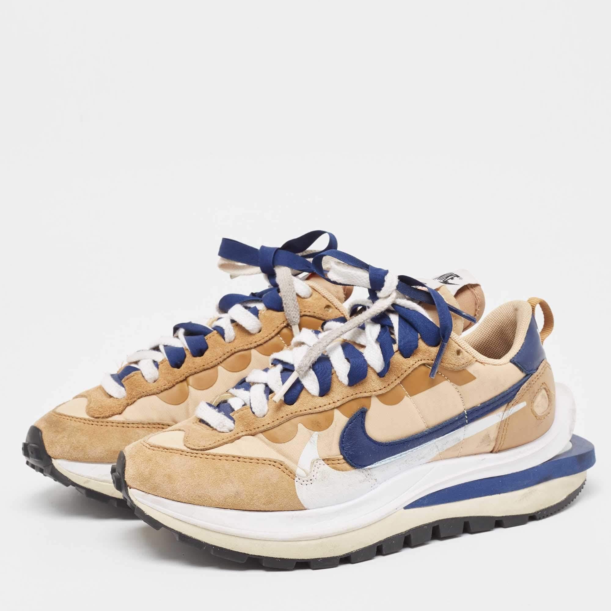 Packed with style and comfort these Nike x Sacai sneakers are gentle on the feet so that you can glide through the day. They have a sleek upper with lace closure and they're set on durable rubber soles.