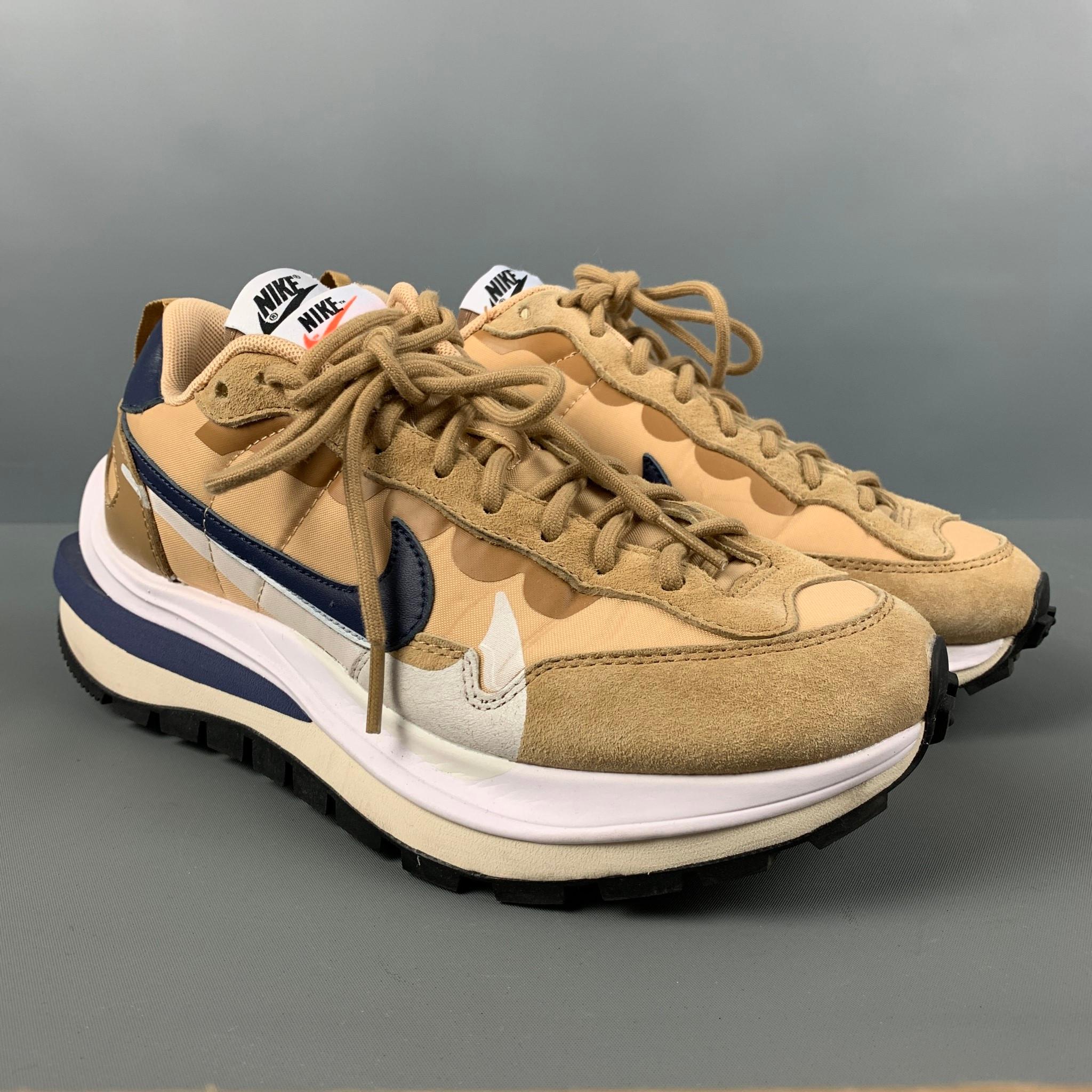 NIKE x SACAI sneakers comes in a tan and navy mixed materials featuring a tan suede detail, double tongue, low-top style, rubber soles, and a lace up closure.

Excellent Pre-Owned Condition.
Marked: 7.5

Outsole: 12 in. x 4.5 in. 

 

SKU: