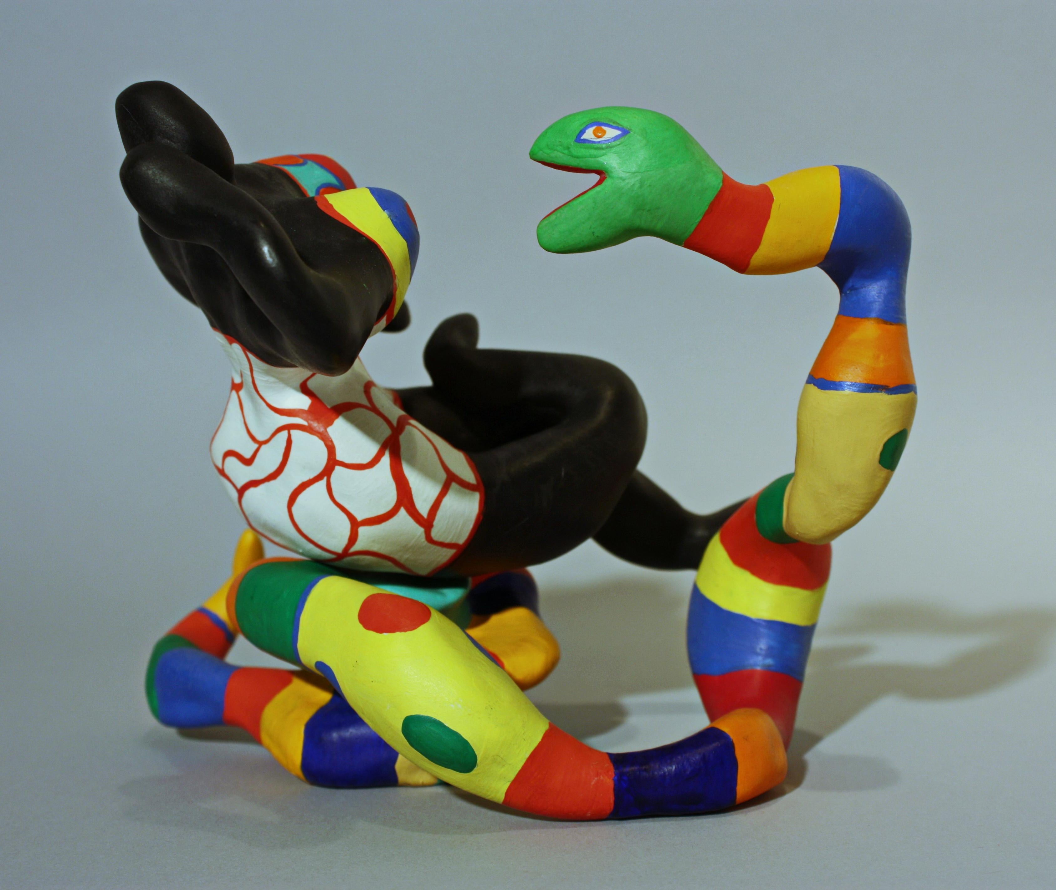 Niki de Saint Phalle, Nana Sitting on a Snake
1984
Resin sculpture hand painted by the artist, signed and numbered at the base below.
Original work of 7 copies.

Niki de Saint Phalle is a French artist known for her colorful sculptural female
