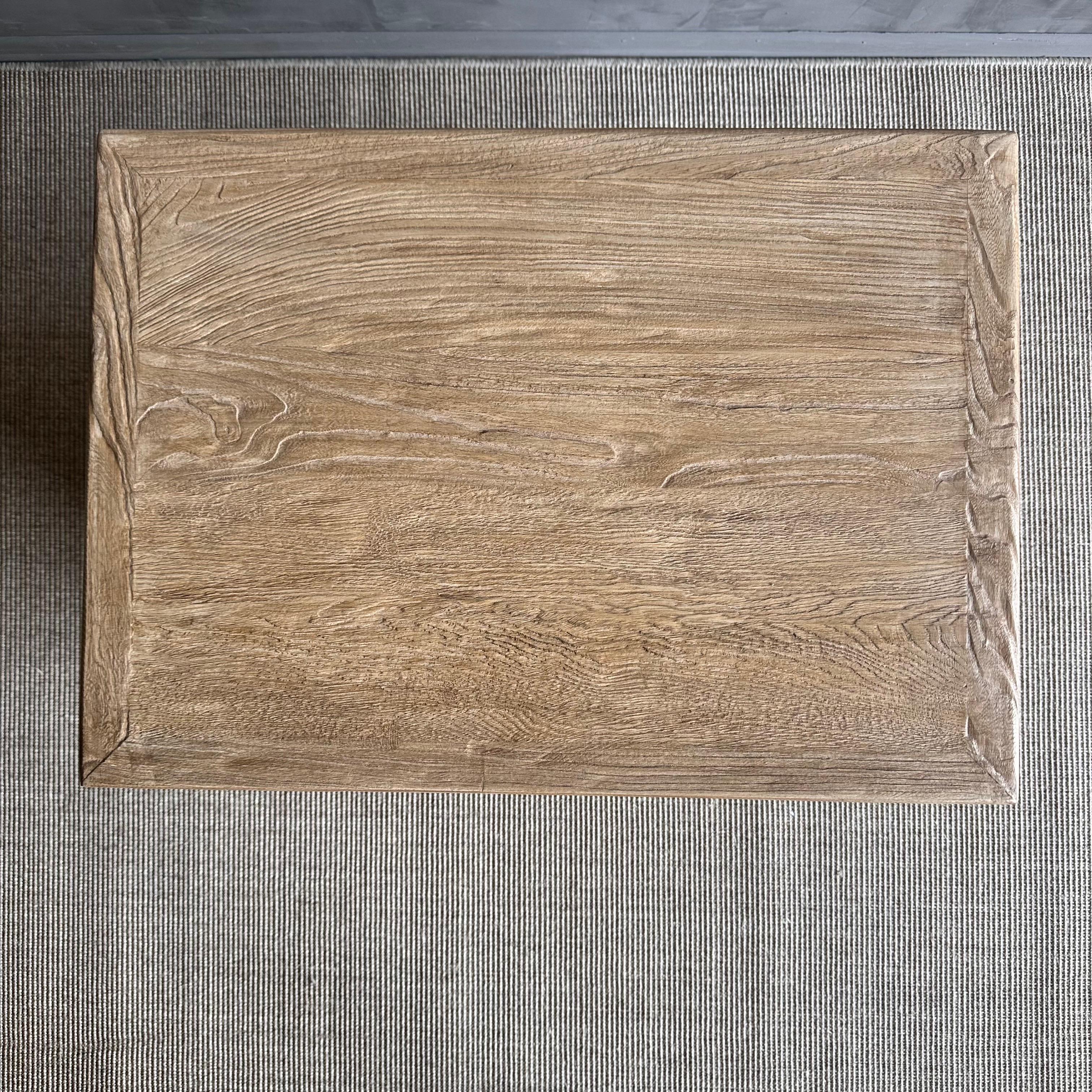 Introducing the Niki Nightstand, crafted from solid reclaimed elm wood with a natural wax finish. 
This stunning piece features two doors providing ample storage space for all your bedside essentials. 
The Niki Nightstand embodies a Wabi Sabi look,
