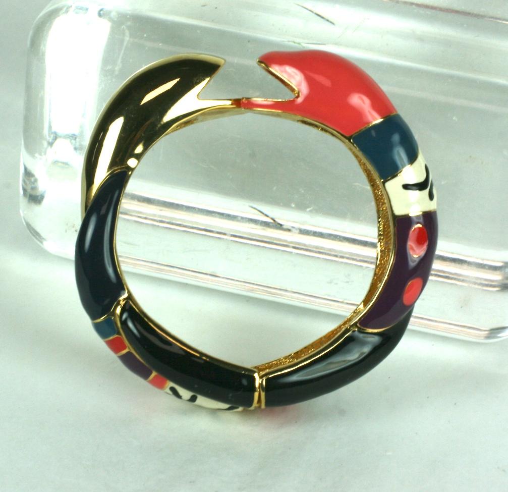 Nikki de St. Phalle Enamel Double Snake Bangle from the 1980's. Polychrome enamel in the brightly hued tones this artist is known for.  Unusual color way. France 1980's. 
Clamper spring action closure.
Smaller size. 2