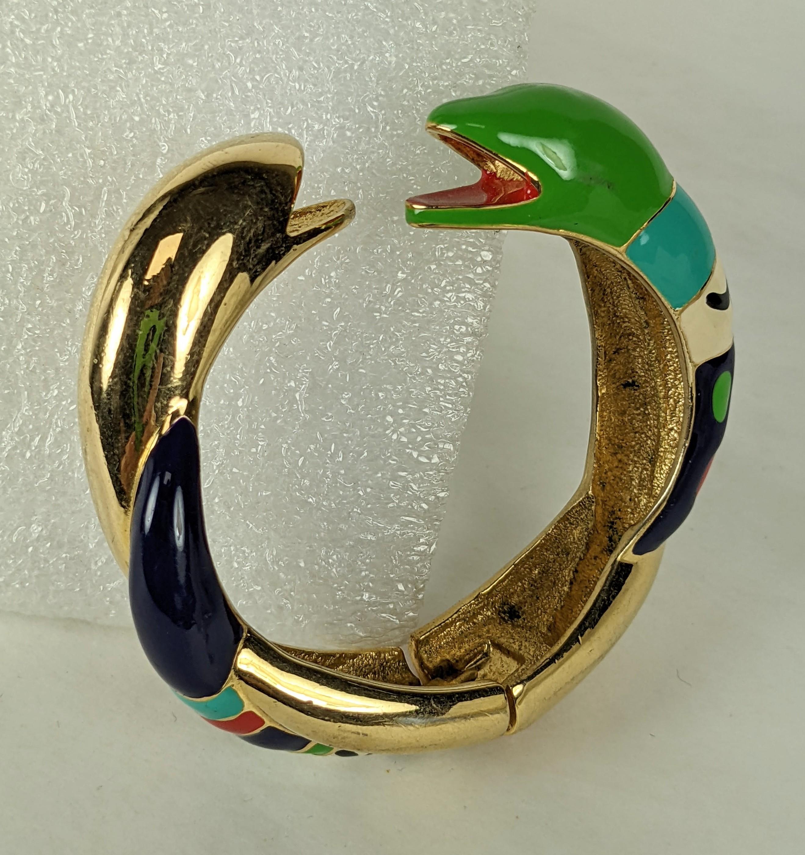 Nikki de St. Phalle Artisan Enamel Double Snake Bangle from the 1982. Polychrome enamel in the brightly hued tones this artist is known for. Lovely color way. France 1980's.
Clamper spring action closure (slightly loose).
Smaller size. 2
