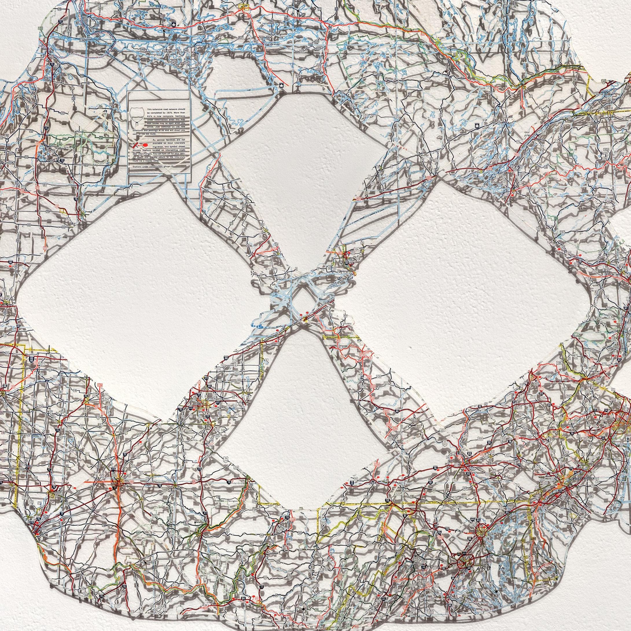 medium: hand-cut road map

The artist says of the inspiration in her latest work . . .
 
Moving to Washington, DC in 2016 changed me. The unraveling of this country's leadership elicited a strong, visceral reaction, and I spent the last year coming