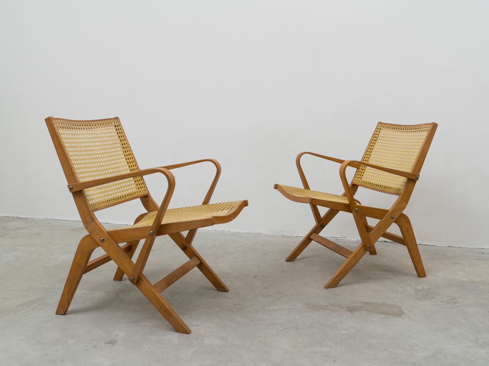 Extremely rare pair of armchairs design by Slovenian architect and designer Niko Kralj. This armchair, mod. 100, were produced only as prototype and never make it to production, because their crafting was too complicated and expensive. They are